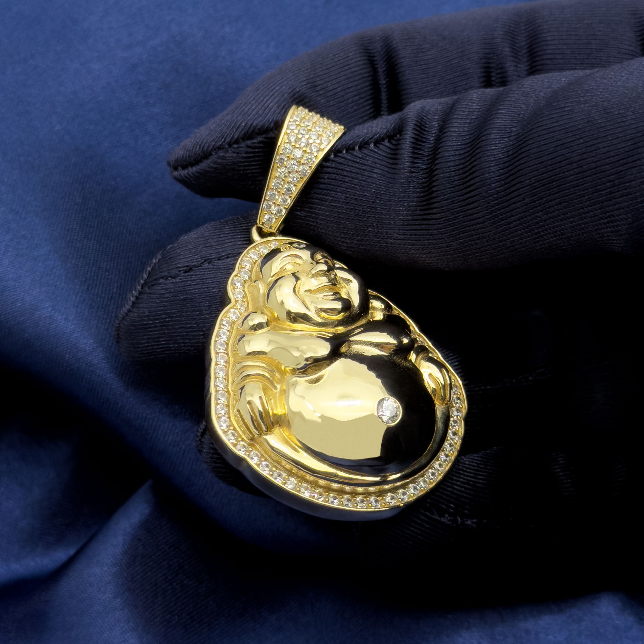 14k Yellow Gold Happy Buddha Pendant with CZ Stones on blue background angle