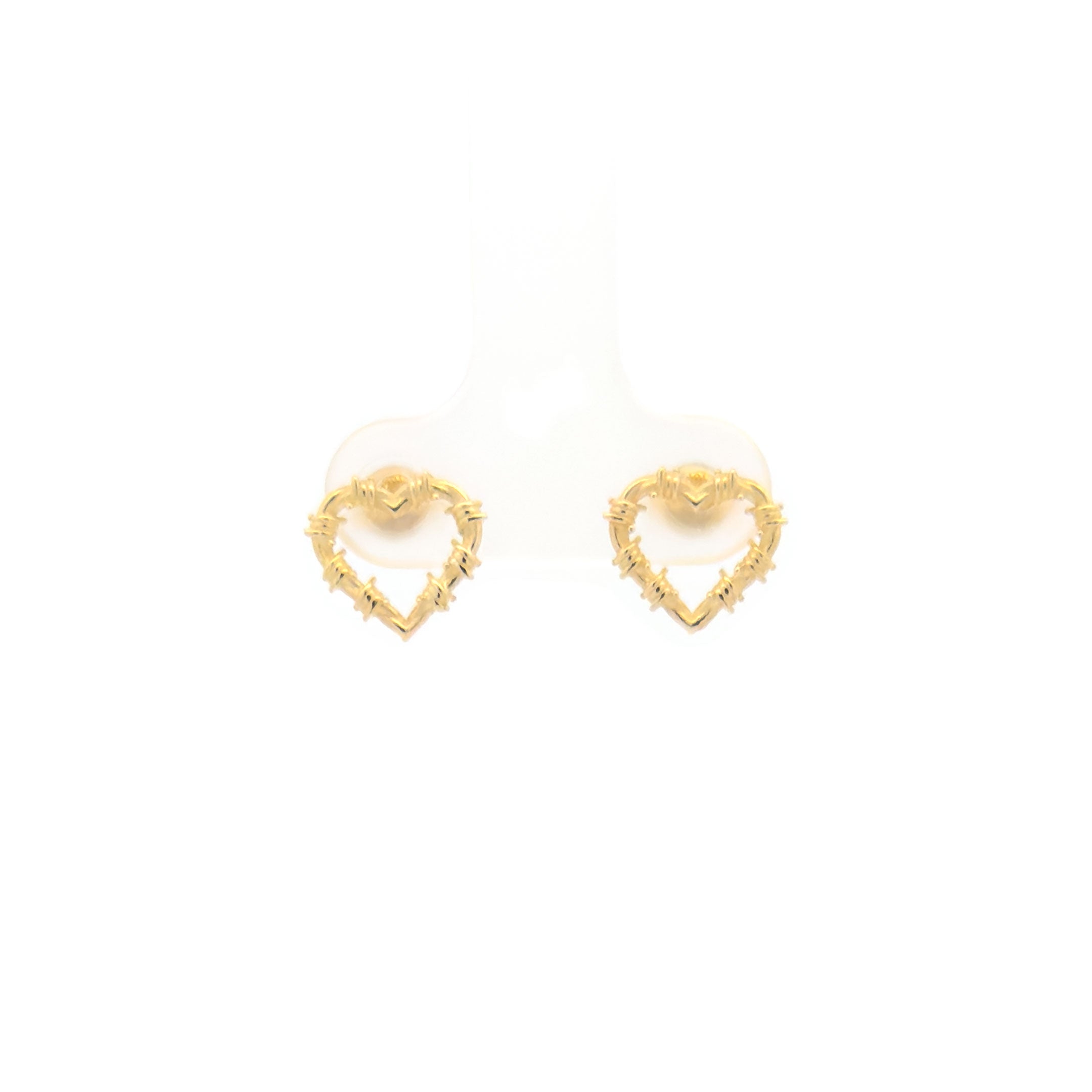 Gold heart-shaped earrings on a white background