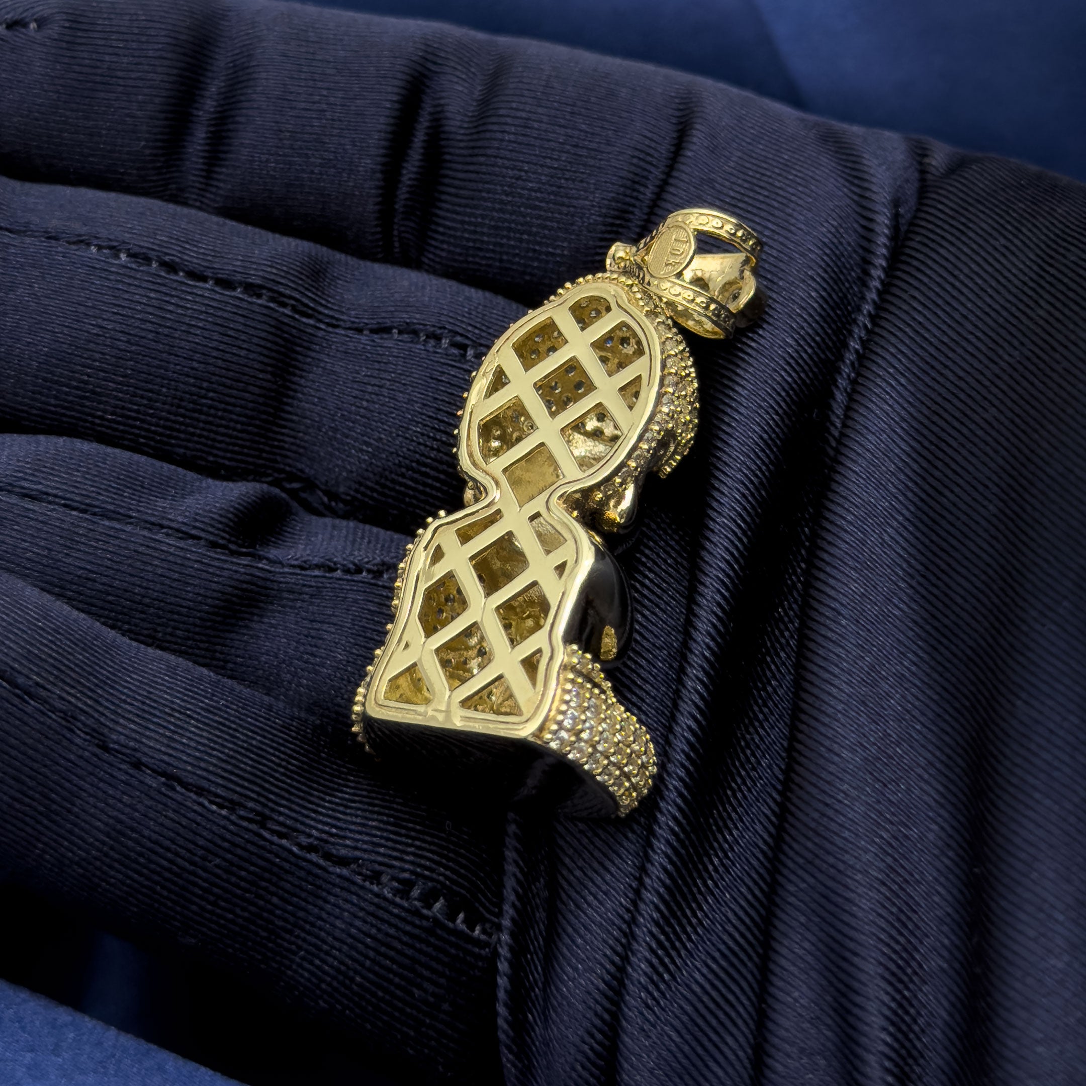 10k Yellow Gold Baby Buddha Full Body Pendant with CZ Stones on blue background back