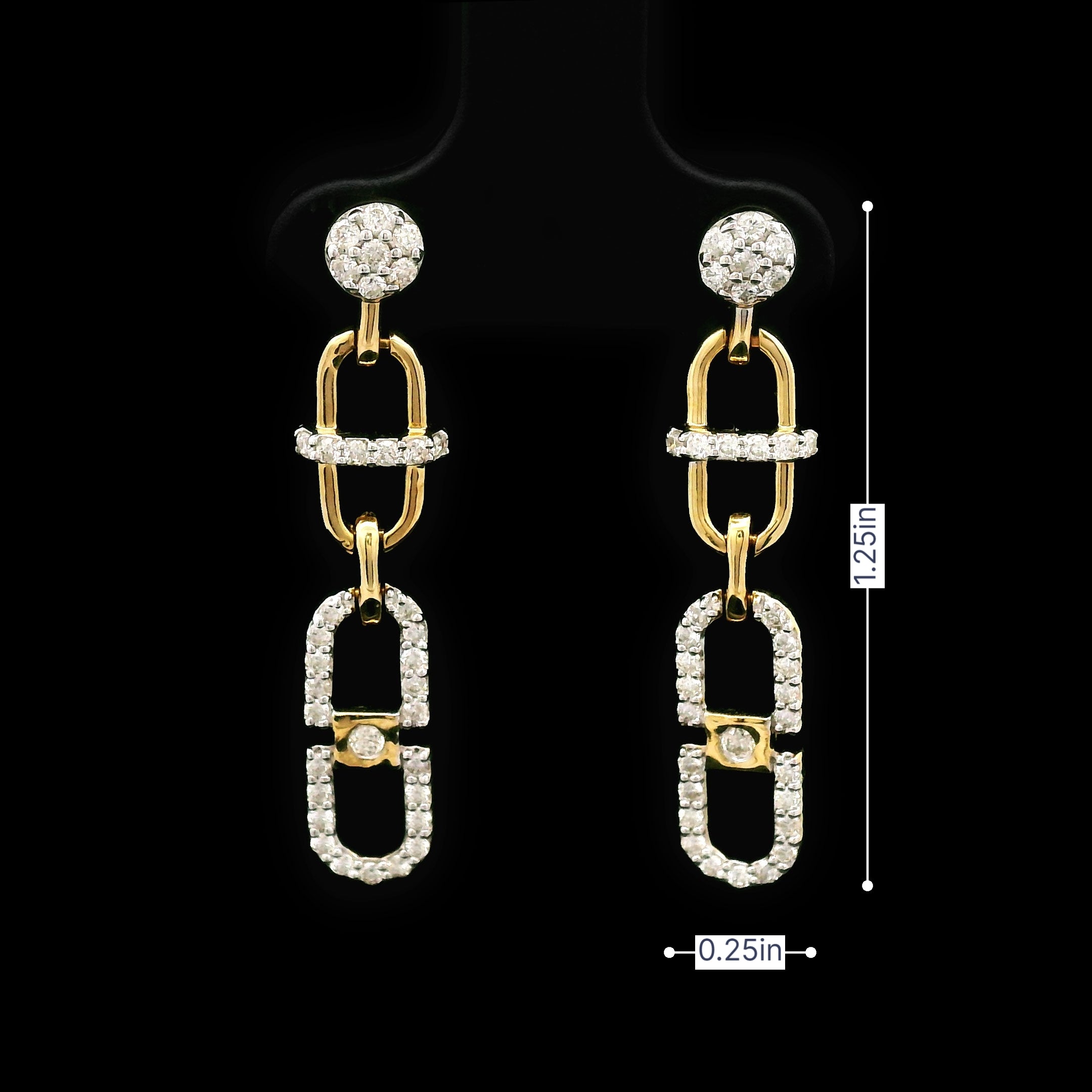 Pair of 14k gold and diamond earrings on a black background with cable design size