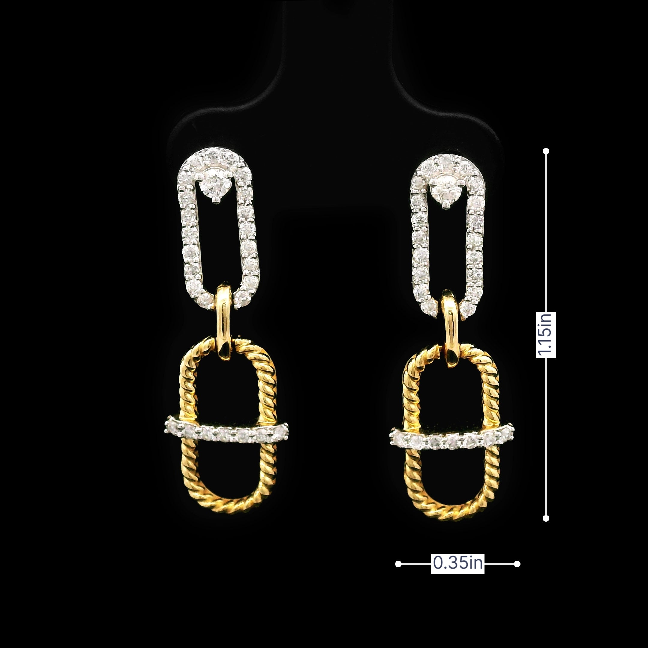 Pair of 14k gold earrings on a black background size