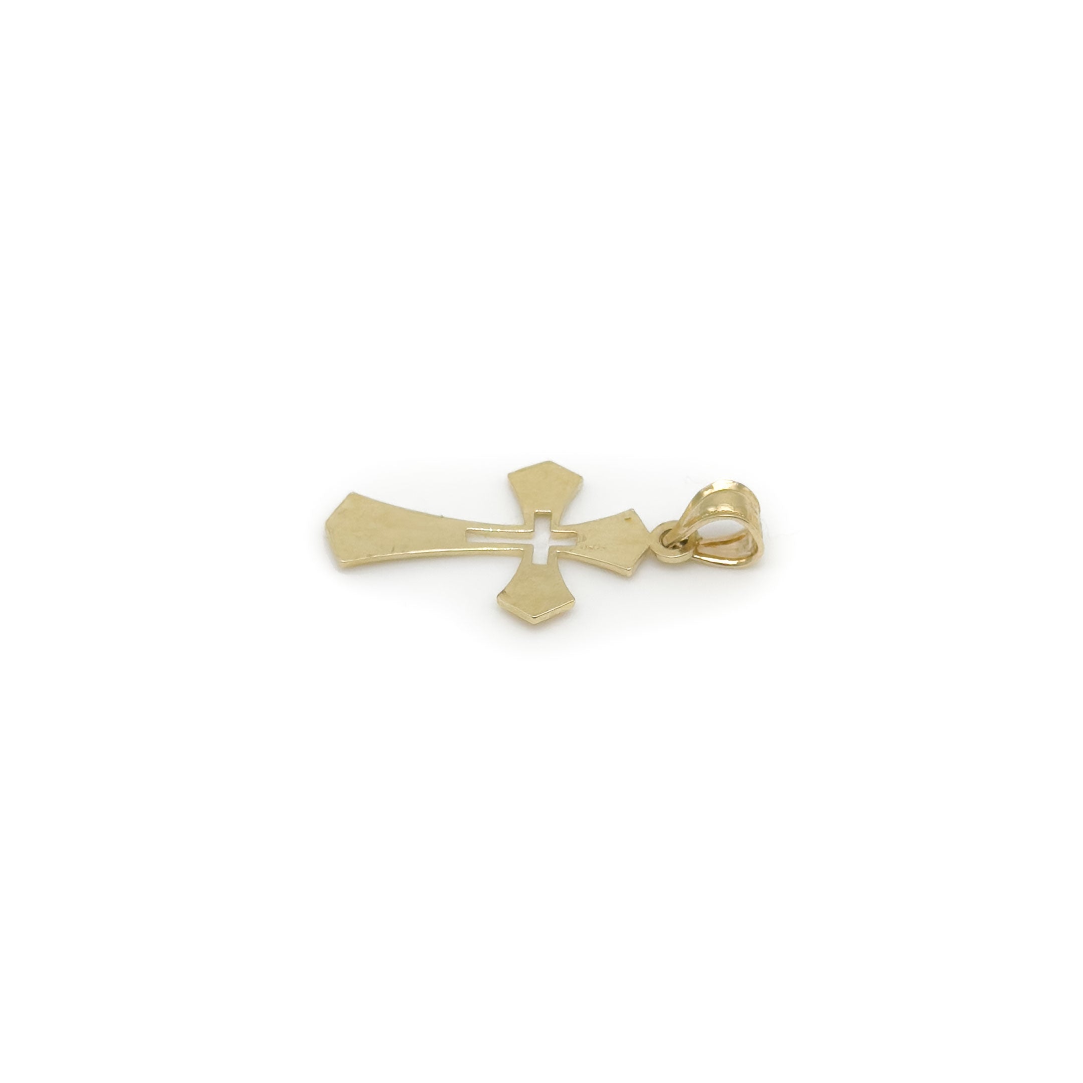 10k yellow gold Victorian shaped cross with filigree details and cut-out in center pendant on white background back