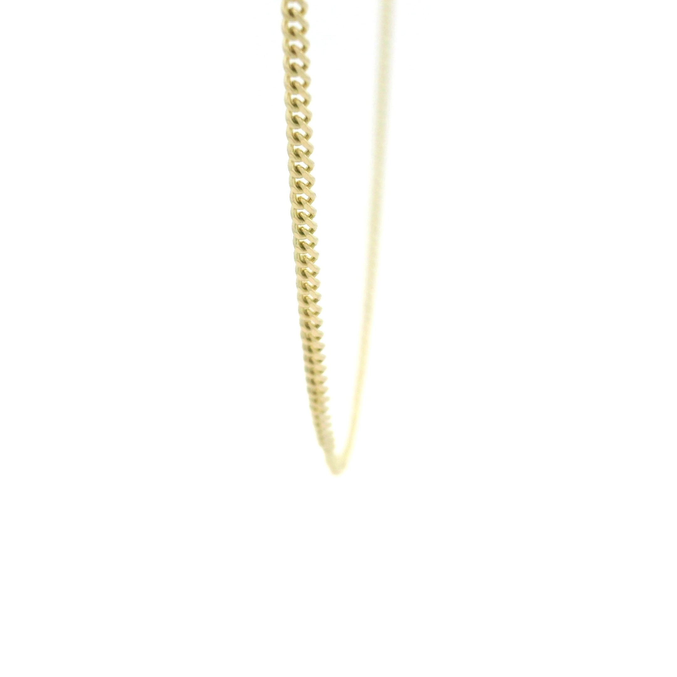 10k solid gold Cuban Link chain necklace 1mm on a white background close