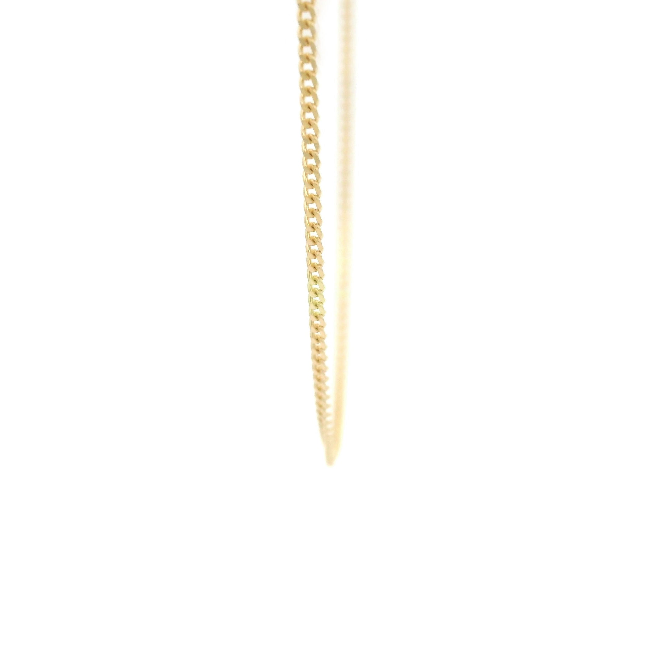 10k yellow gold solid cuban fine chain 1mm on white background close up