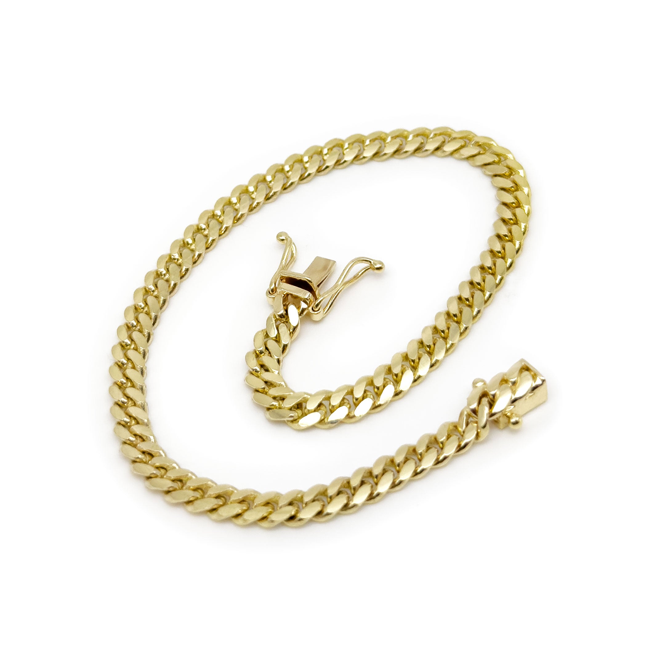 10k Solid Cuban Bracelet 4.25mm on a white background opened
