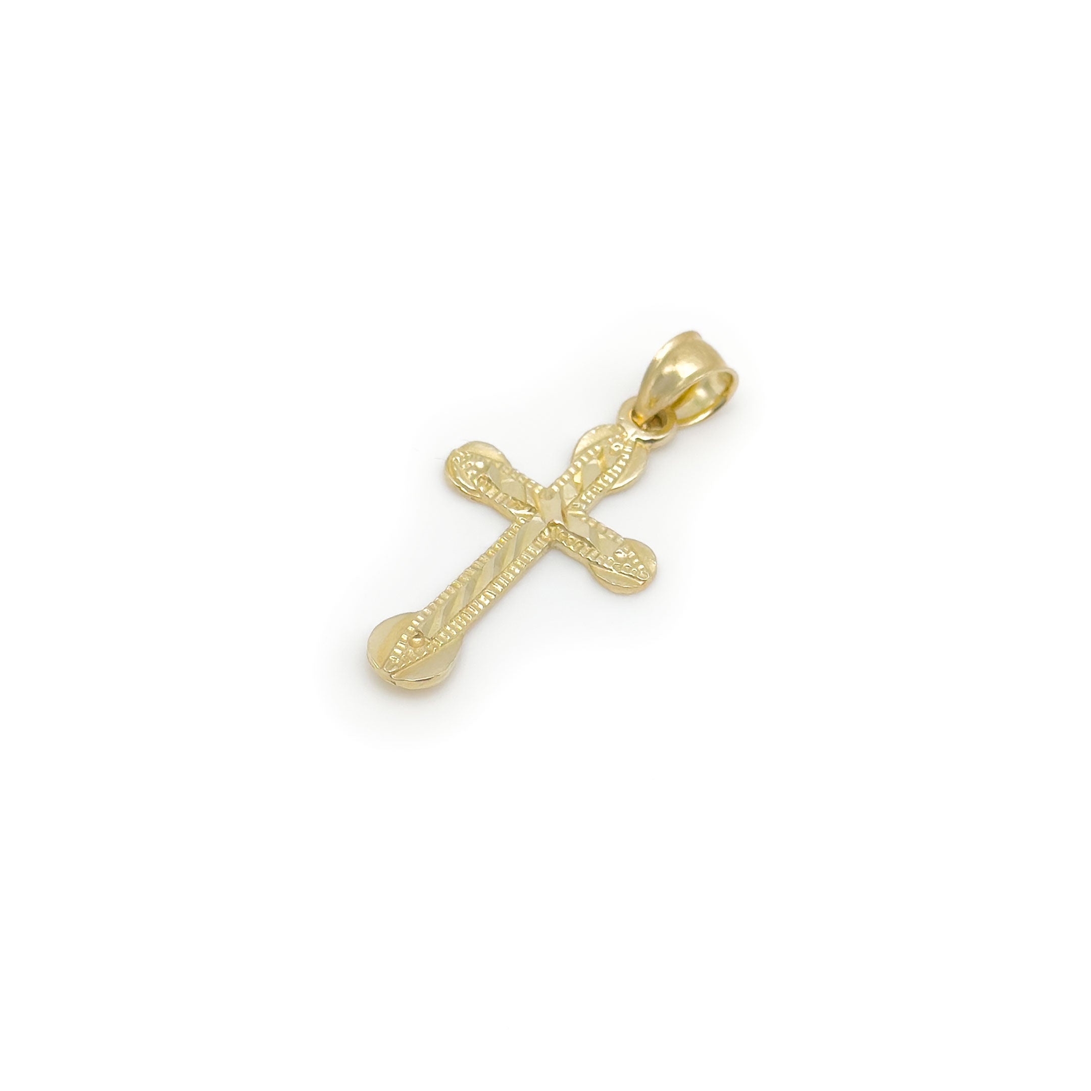 10k yellow gold diamond cut design cross pendant with round ends on white background