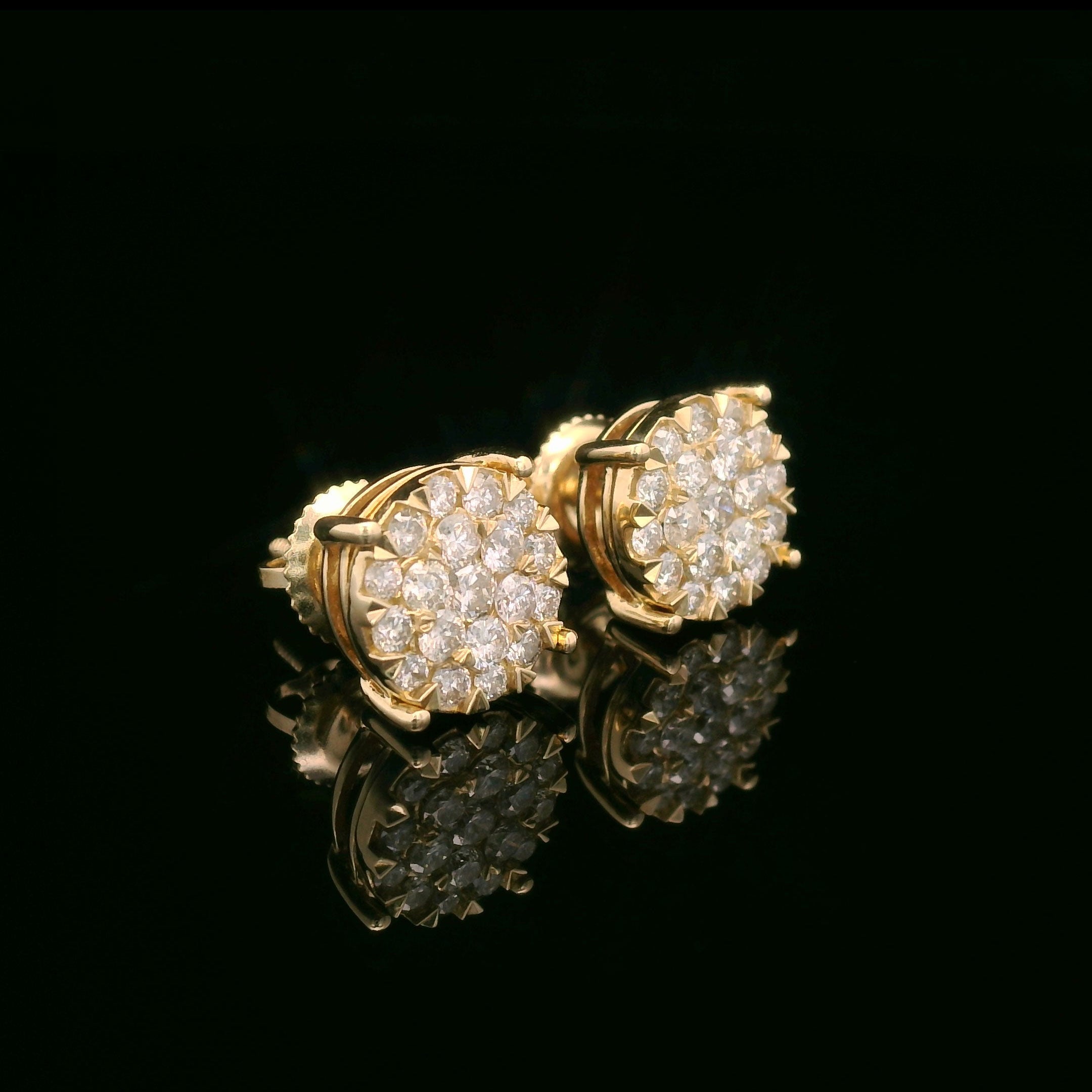 Round natural diamond studs in 14k yellow gold side