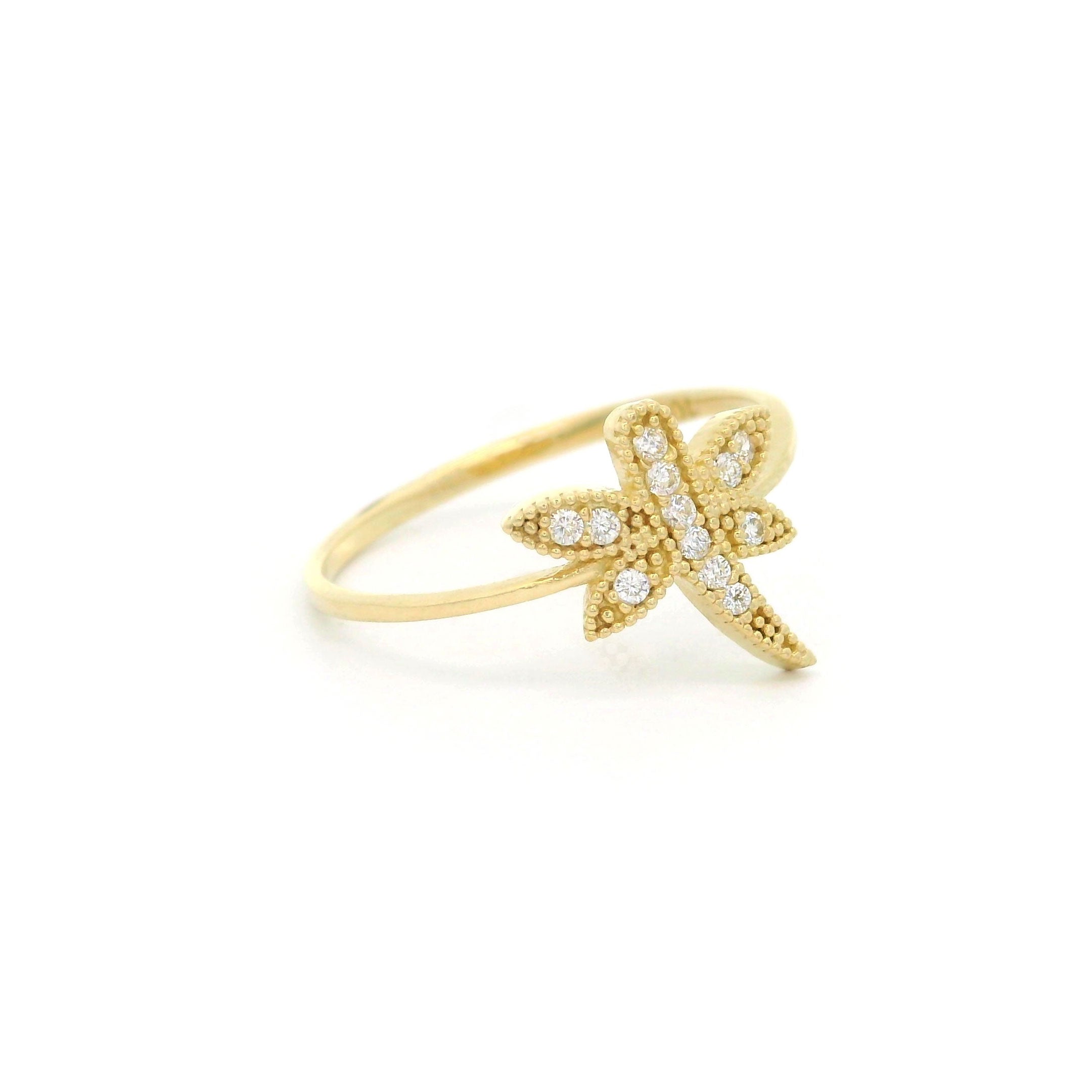 10k yellow gold ring with dragon fly and cz accents on a white background left side