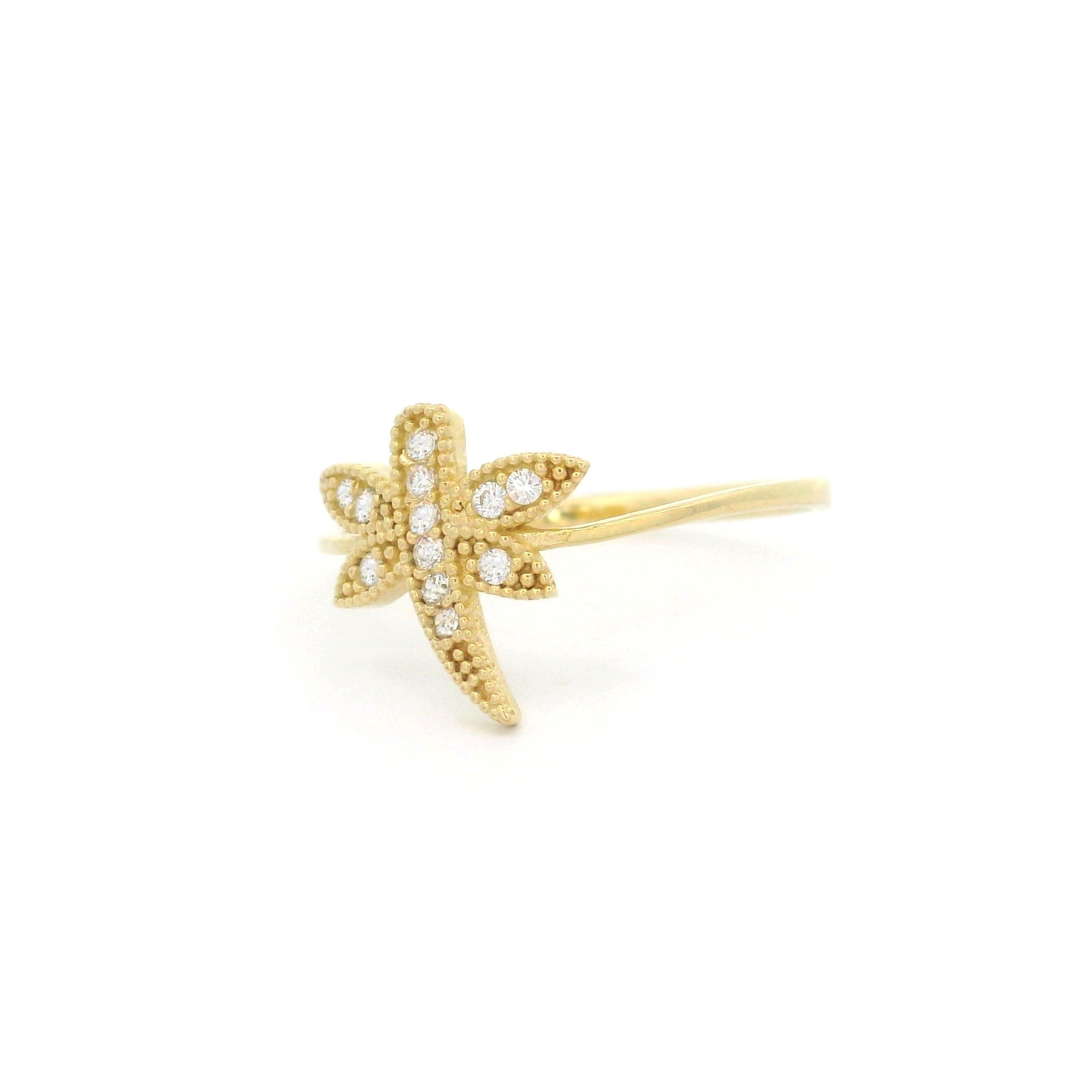 10k yellow gold ring with dragon fly and cz accents on a white background right side