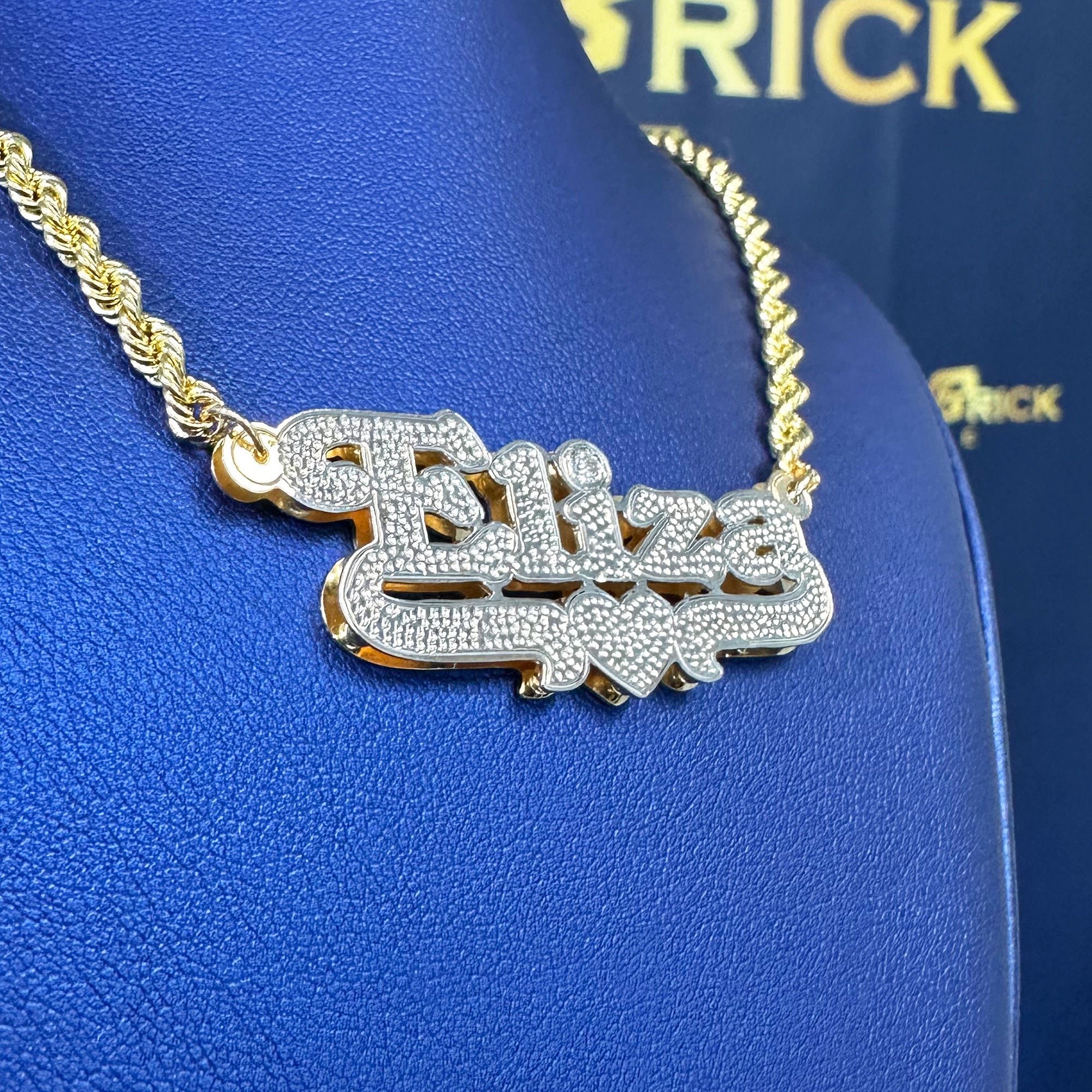 Custom Eliza name pendant with diamond cut and diamond in the 