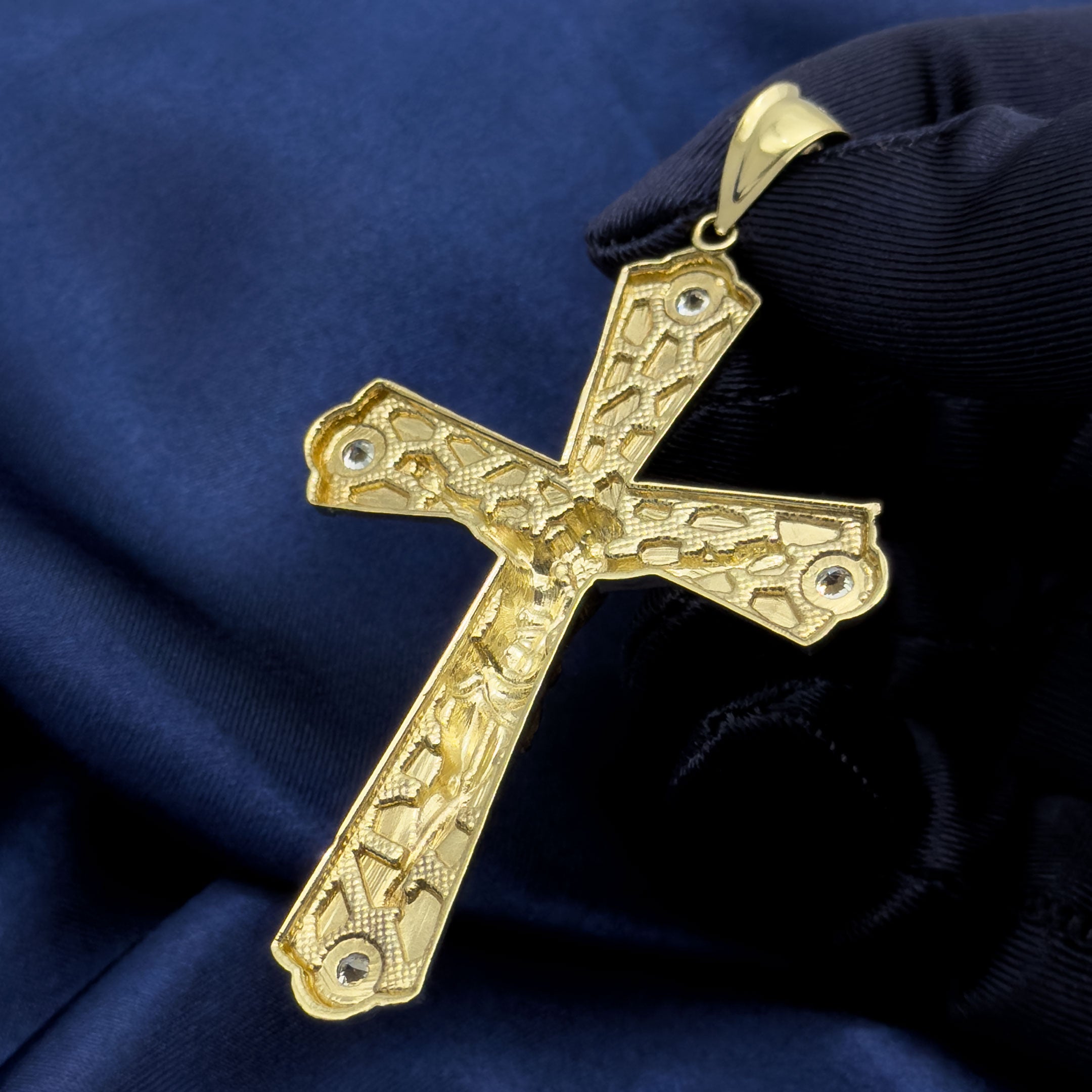 10k Yellow Gold Nugget Crucifix Flare Cross Pendant with blue background back