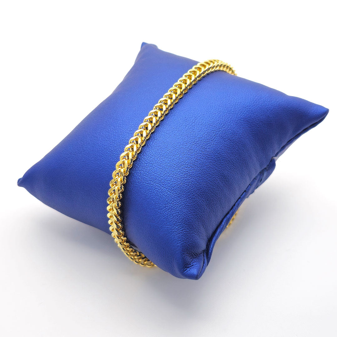 10k Yellow Gold Franco Bracelet 4mm on Blue Pillow