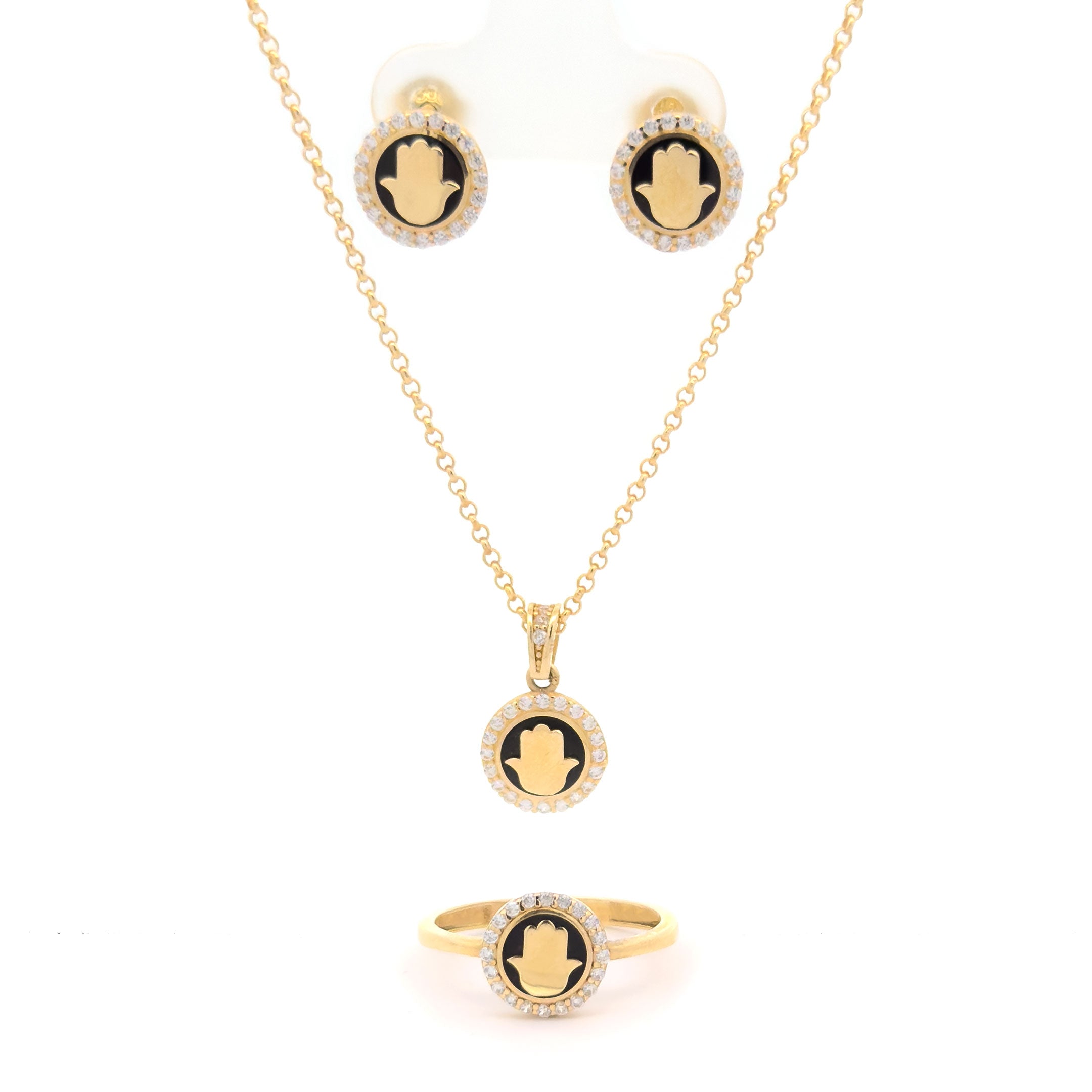 Gold necklace, earrings, and ring set with hamsa hand design with black enamel and cz's on a white background