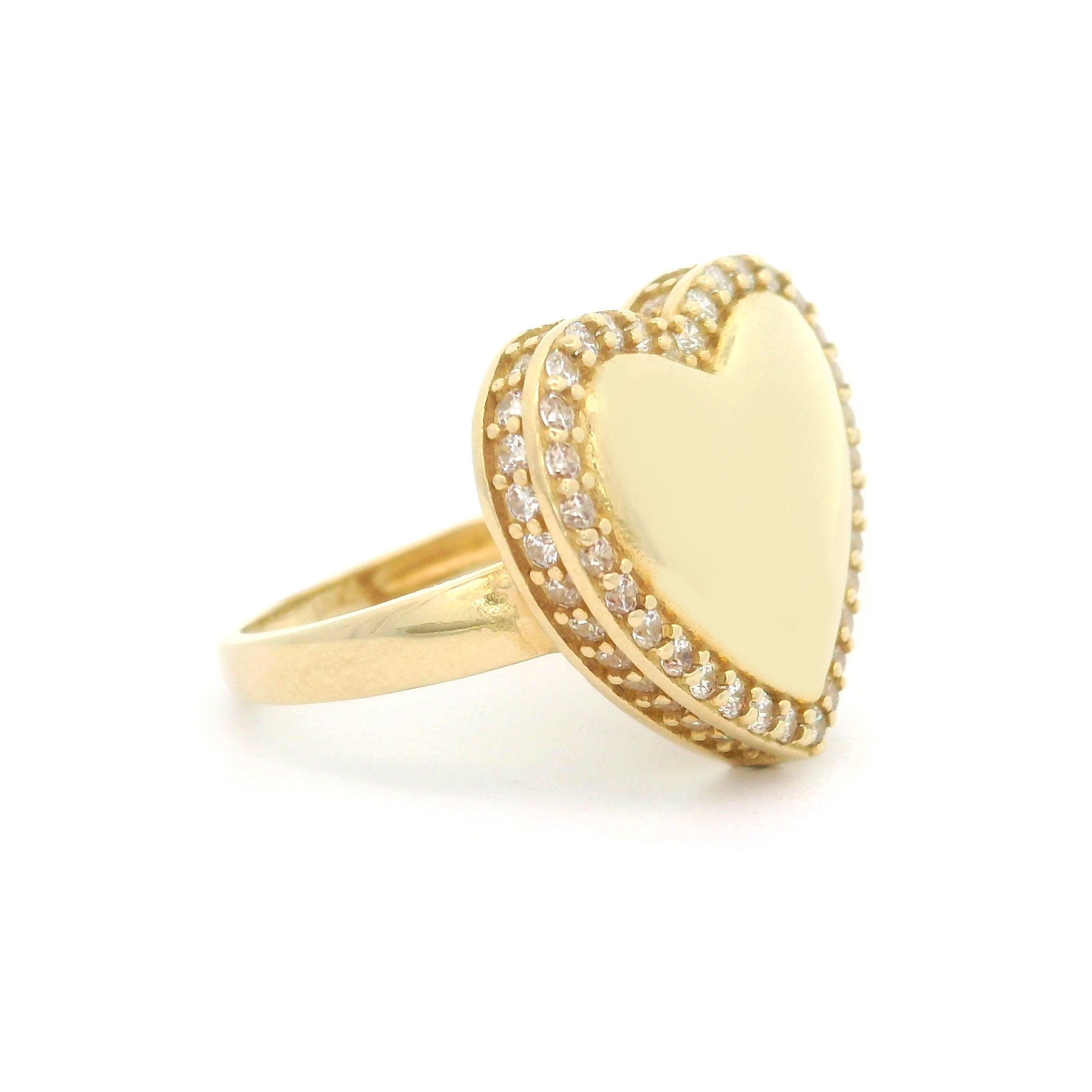 10k yellow gold heart ring with stones around border on white background left side