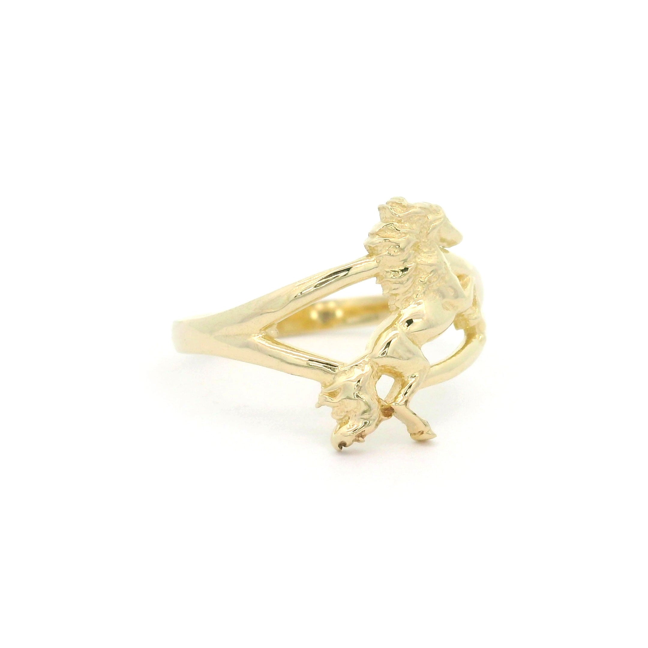 10k yellow gold ring with a horse in rearing pose on a white background left side