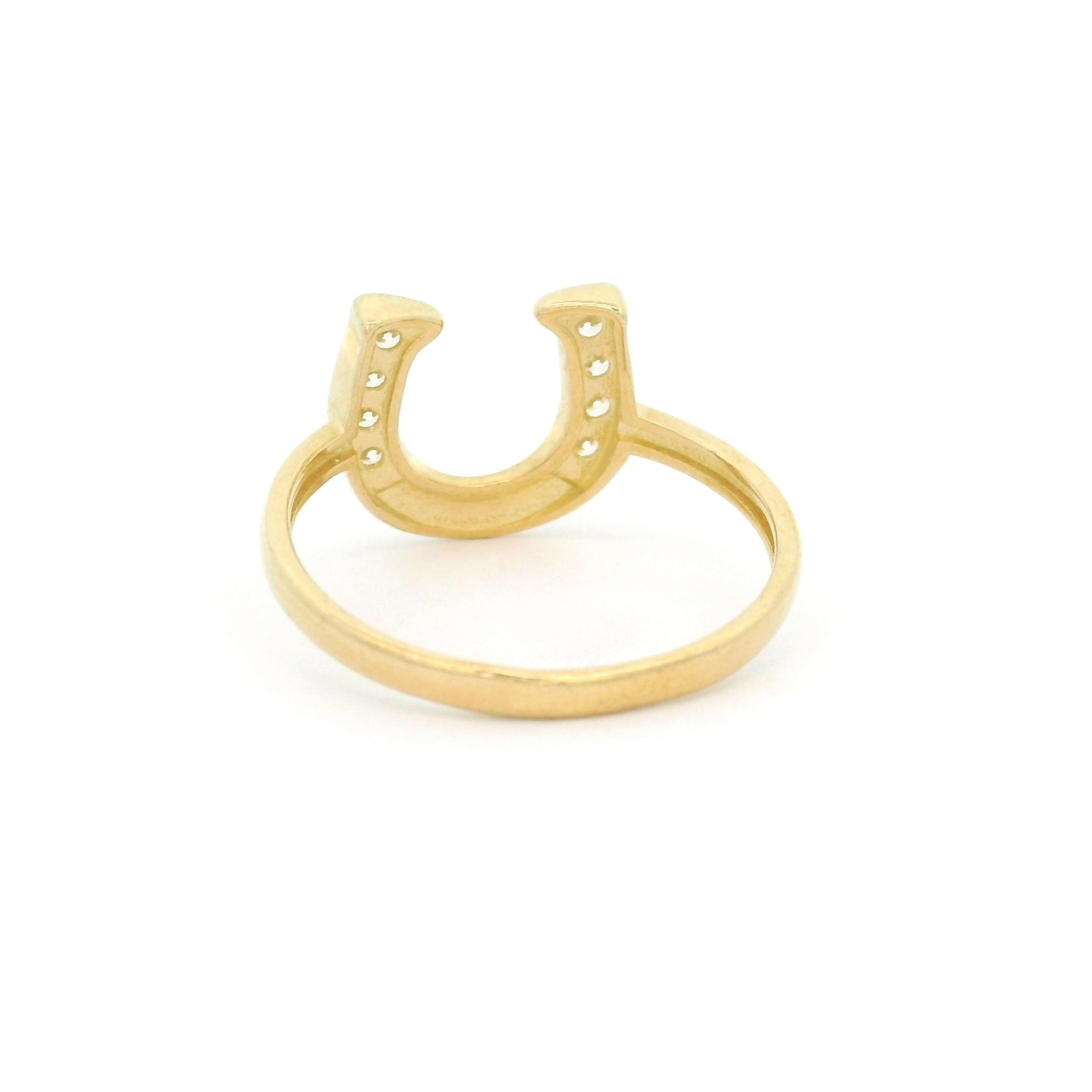 10k yellow gold horseshoe ring with stones on white background back view