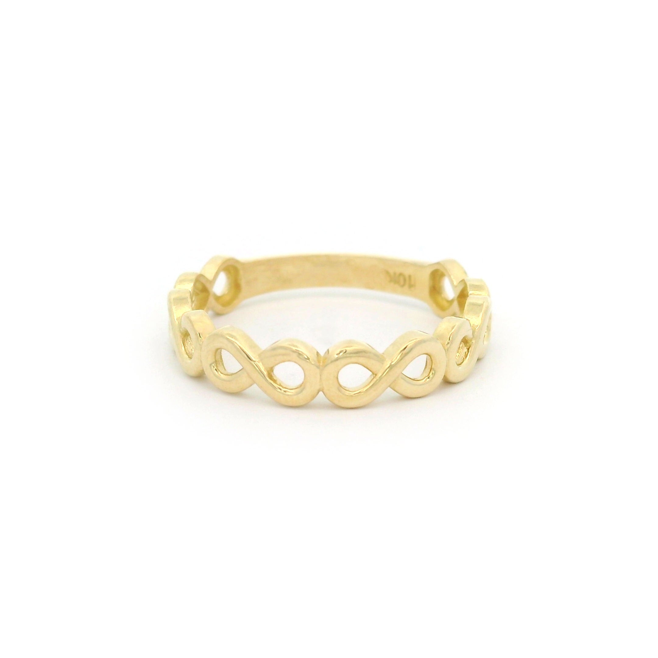 10k yellow gold ring with a infinity design on a white background