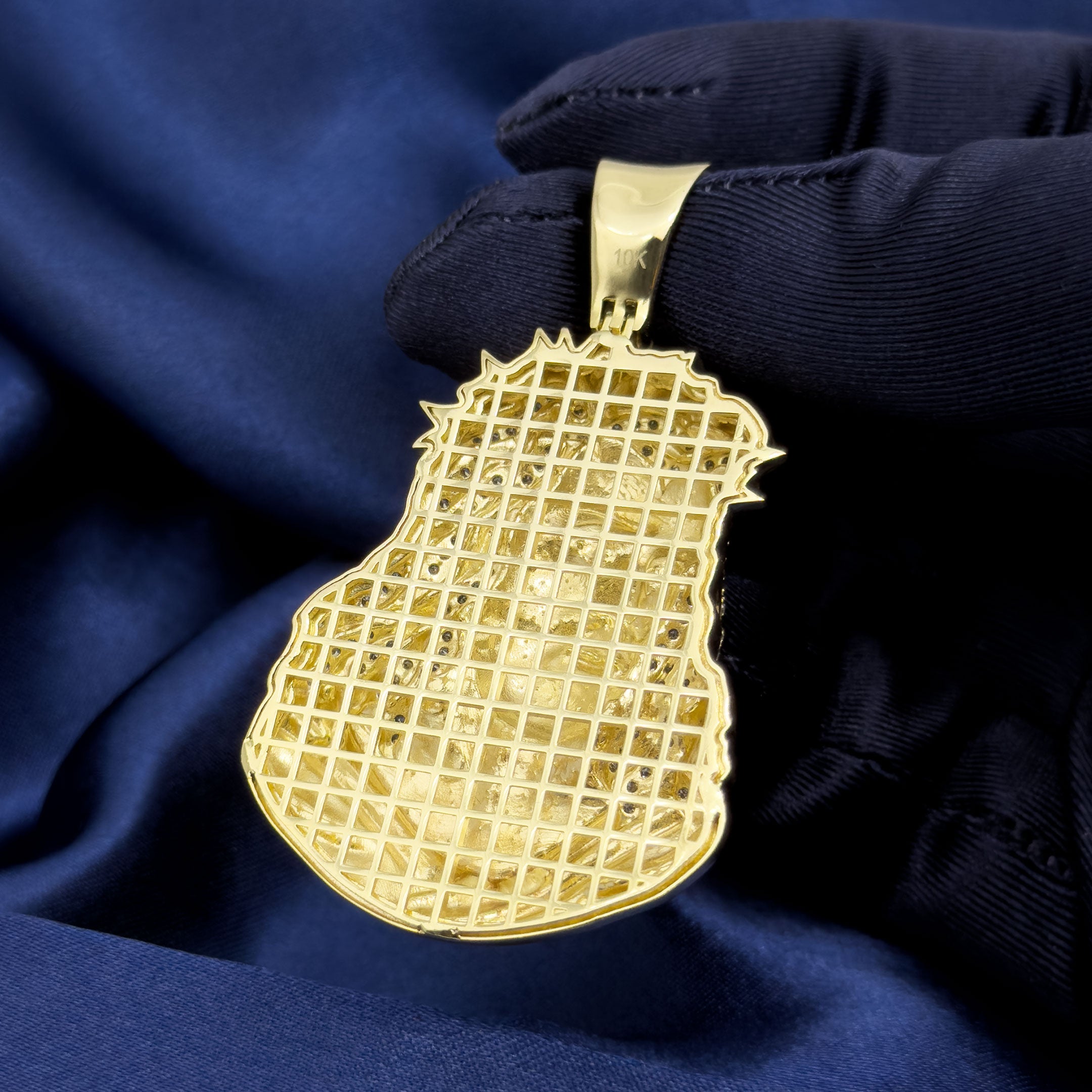 10k Yellow Gold Jesus Head Pendant with Thorns on blue background back