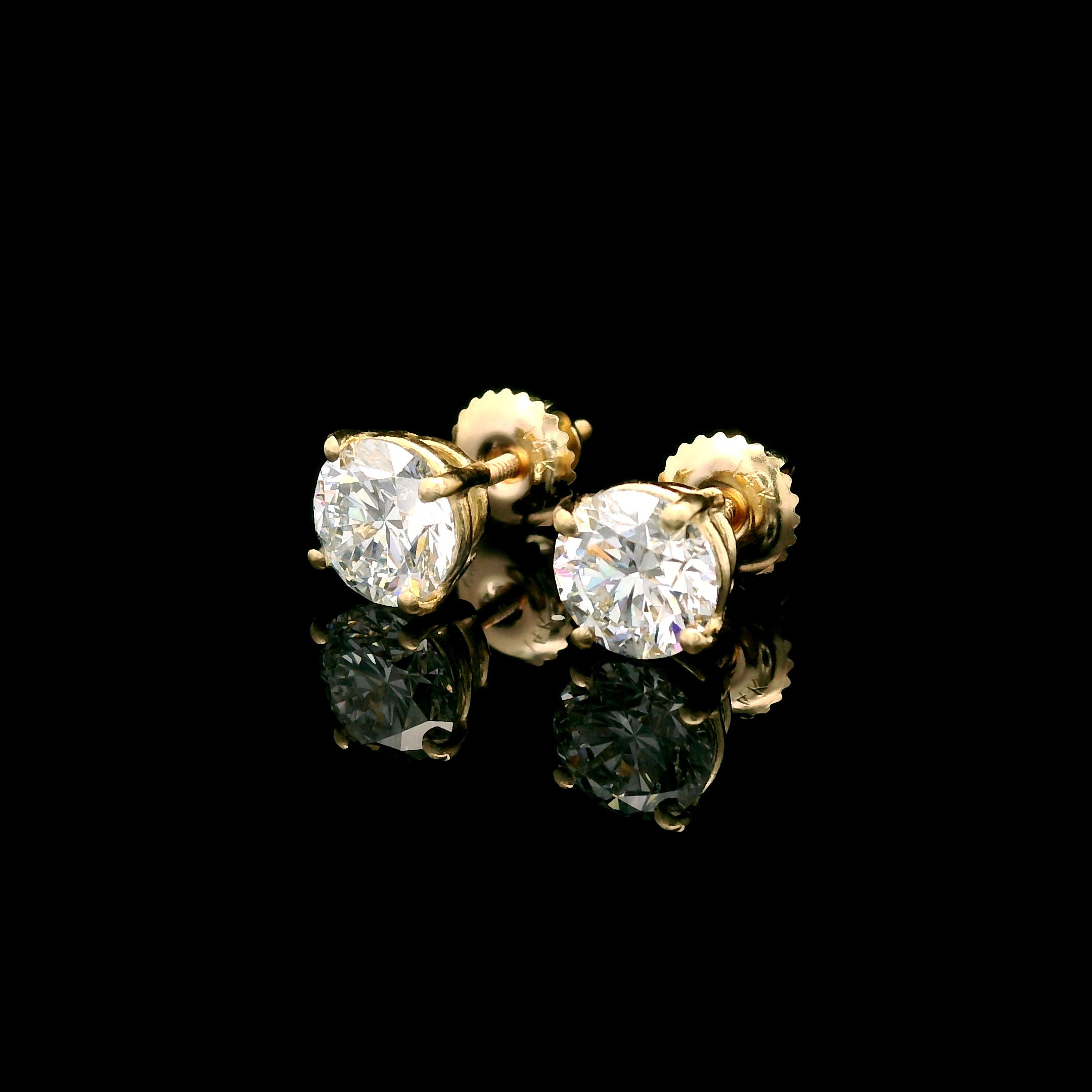 14k Gold 2 CTW Lab-Diamond Four-Prong Solitaire Screw Back Stud Earrings on black background left