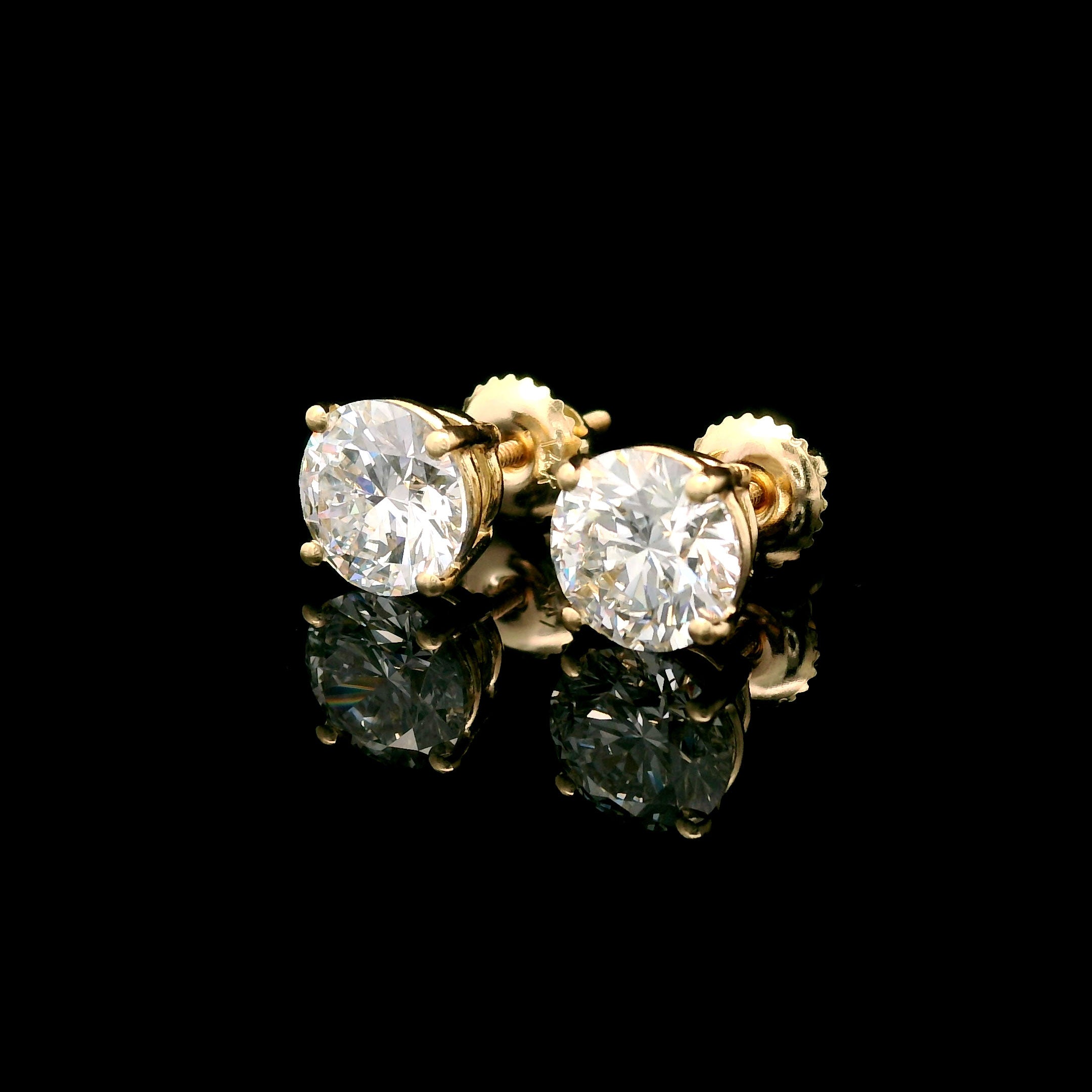 14k Gold 3 CTW Lab-Diamond Four-Prong Solitaire Screw Back Stud Earrings on black background left