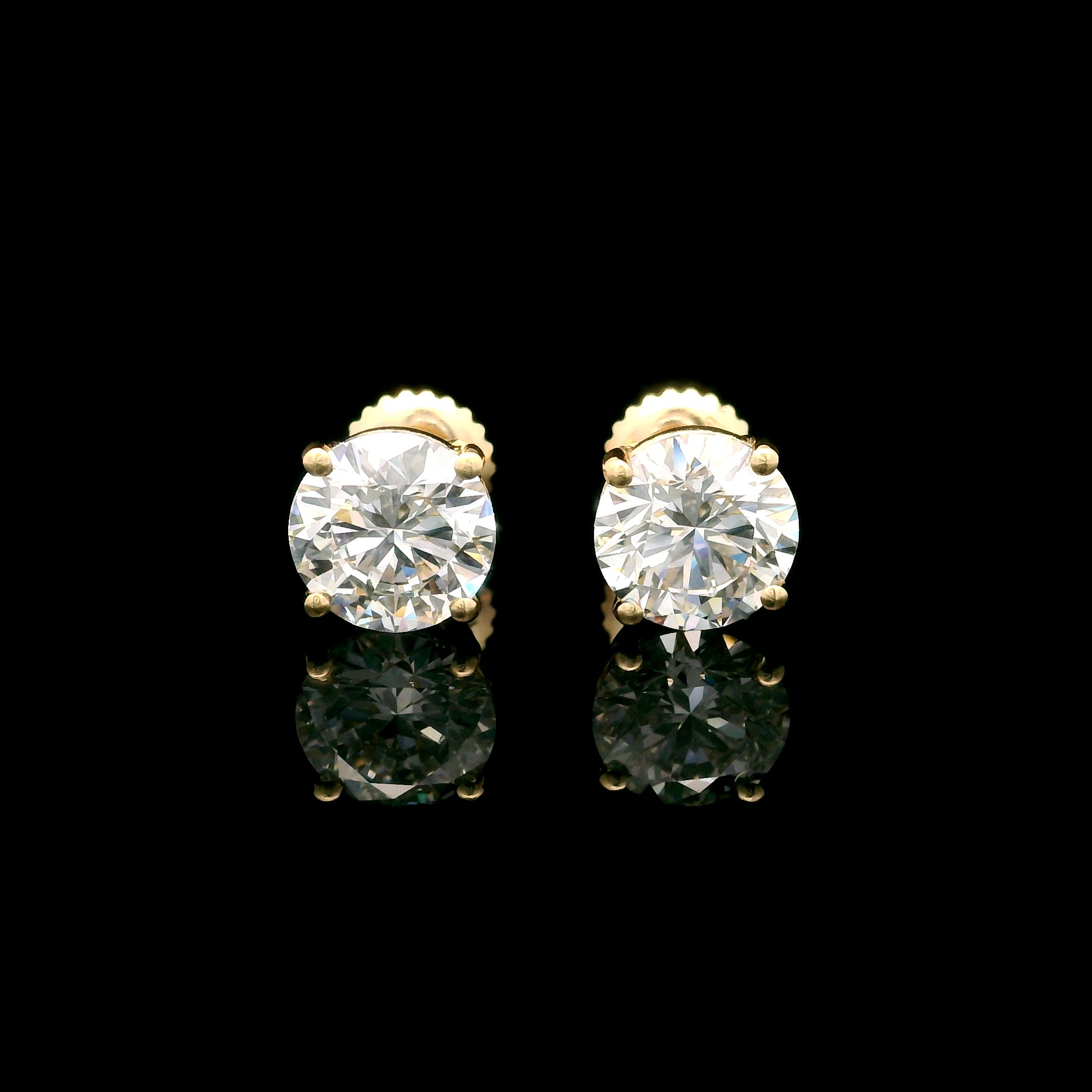 14k Gold 3 CTW Lab-Diamond Four-Prong Solitaire Screw Back Stud Earrings on black background