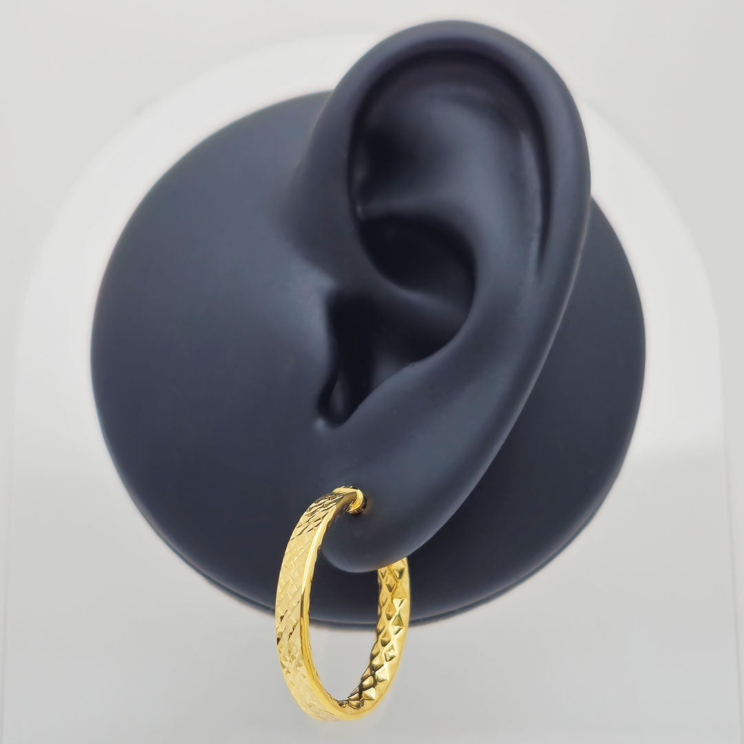 14k Oval Diamond Cut Hoop Earrings on Earring Display