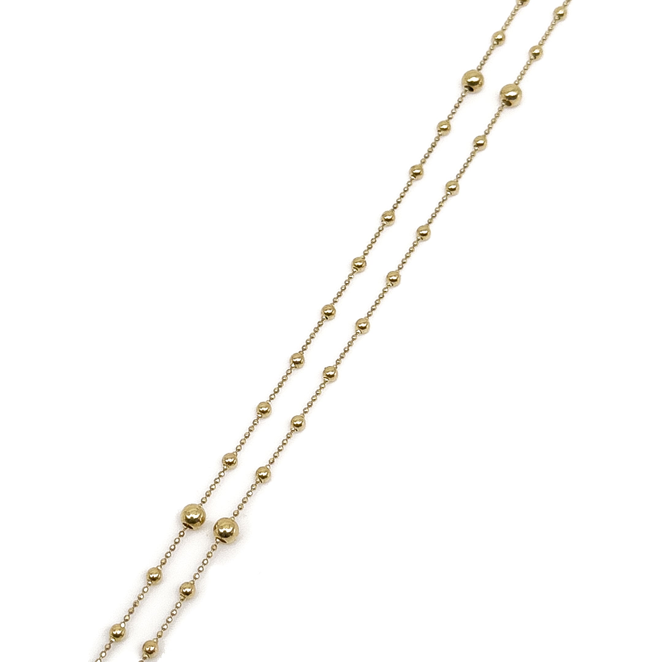 Solid 14k Yellow Gold Rosary Necklace - close up of ball design on a white background