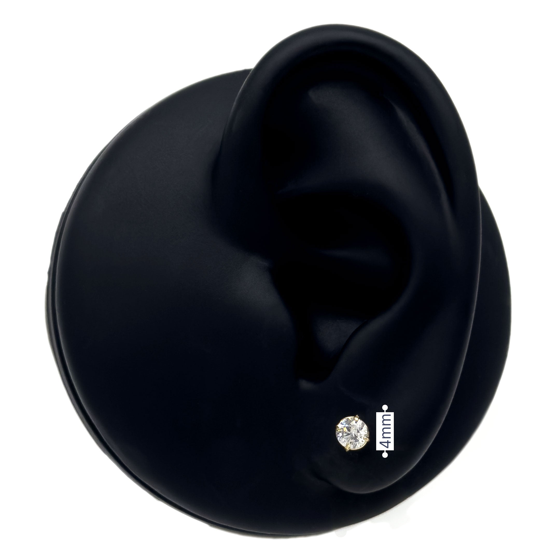 10k yellow gold studs with cz stone in basket setting 4mm on black silicone ear