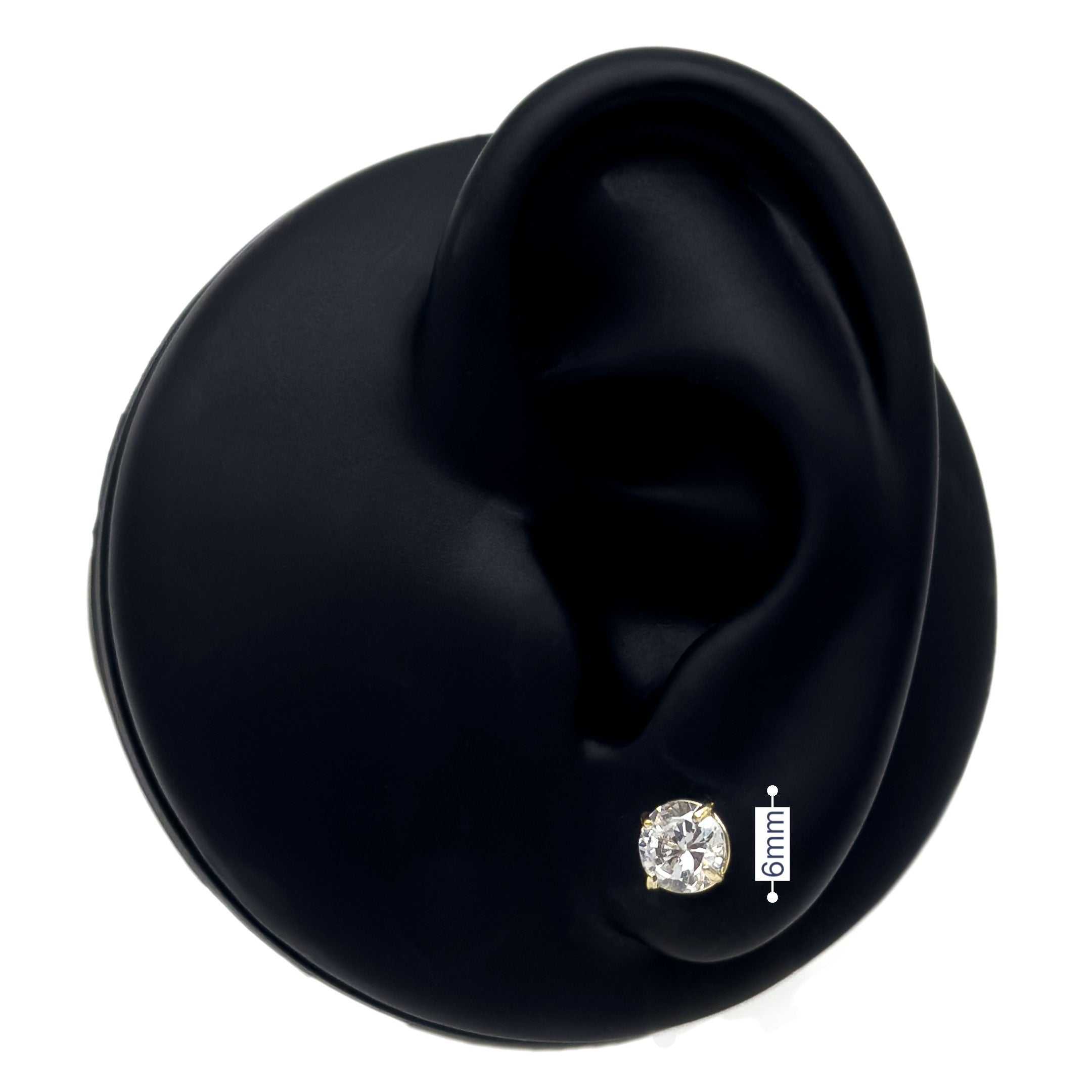 10k yellow gold studs with cz stone in basket setting 6mm on black silicone ear display