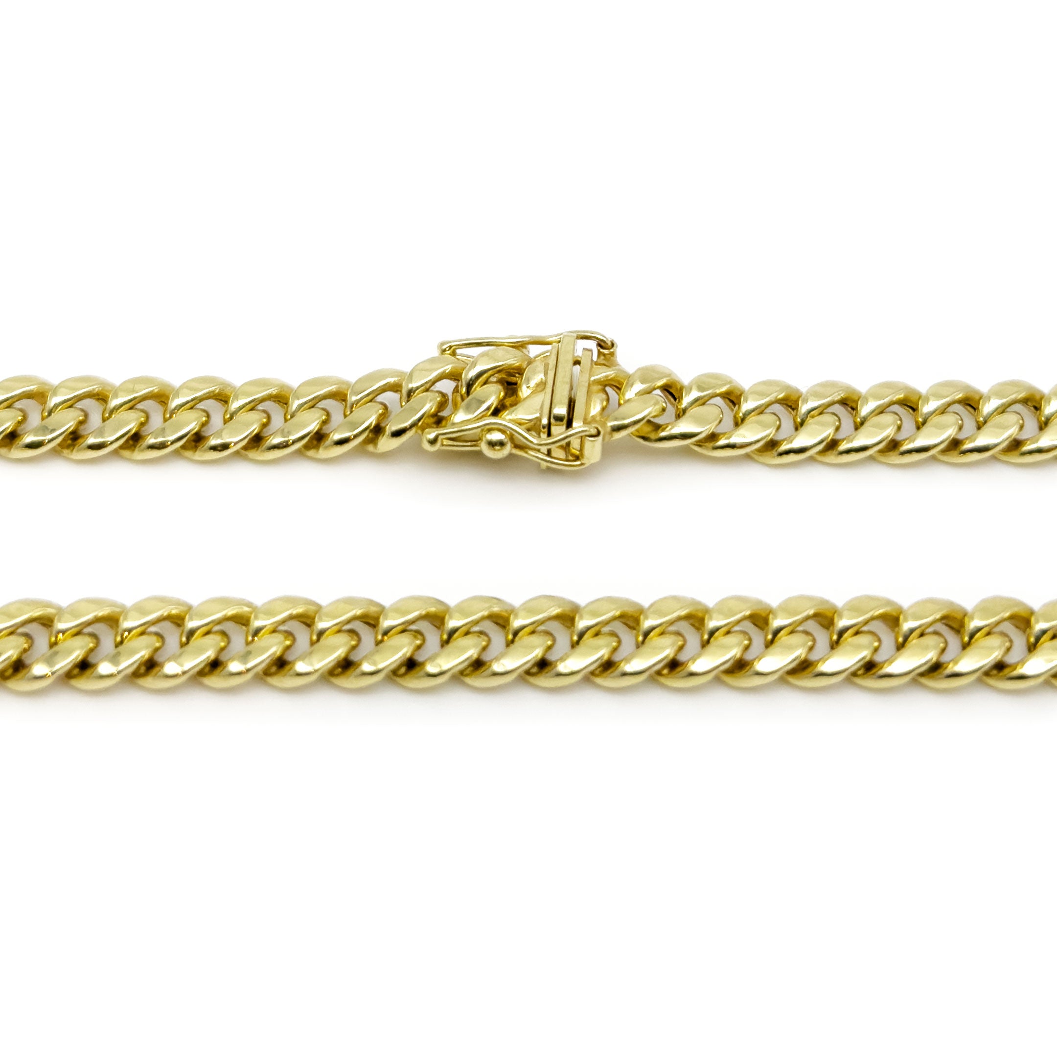 10k Yellow Gold Semi-Hollow Cuban Chain 5.75mm on a white background close up box lock