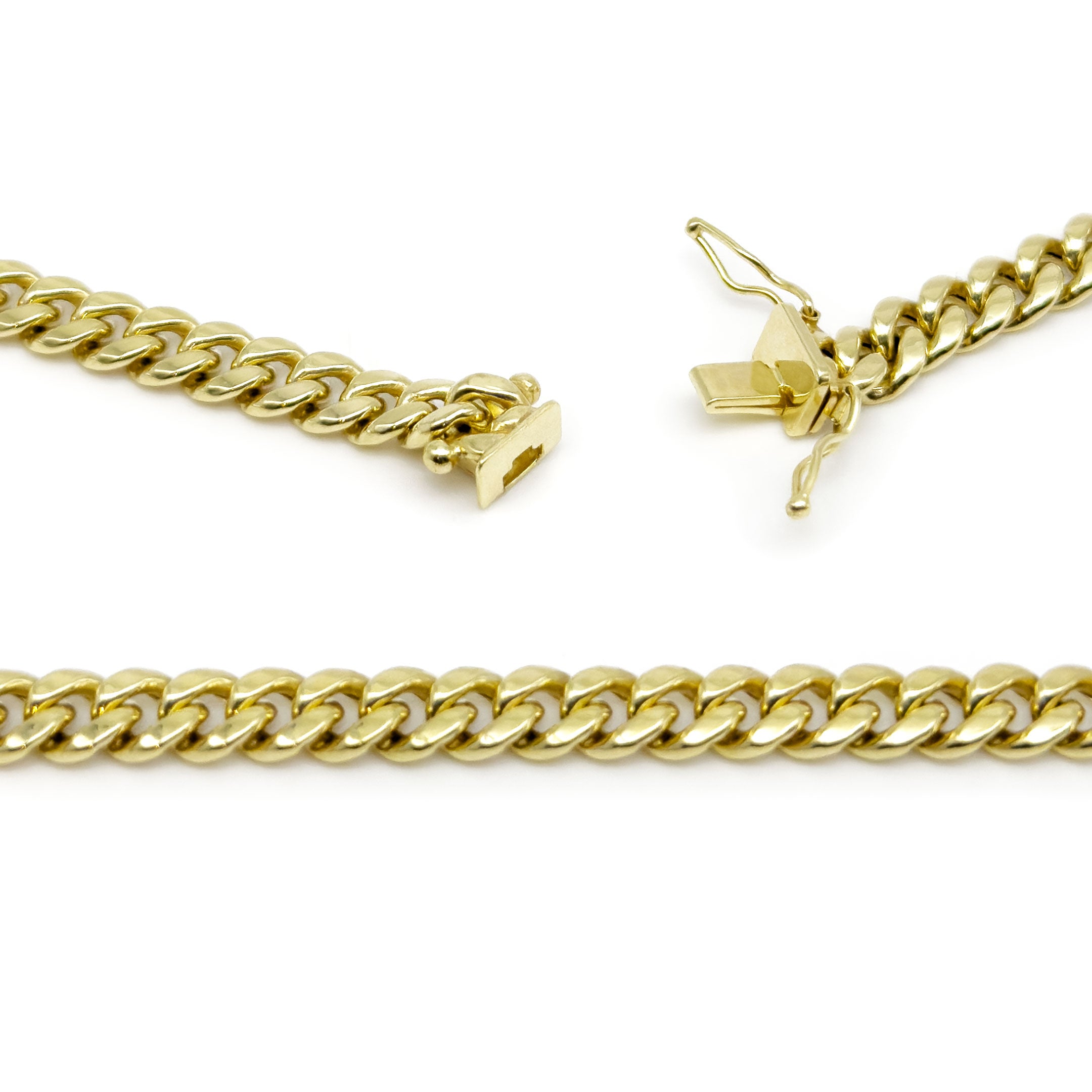 10k Yellow Gold Semi-Hollow Cuban Chain 5.75mm on a white background close up of opened box lock