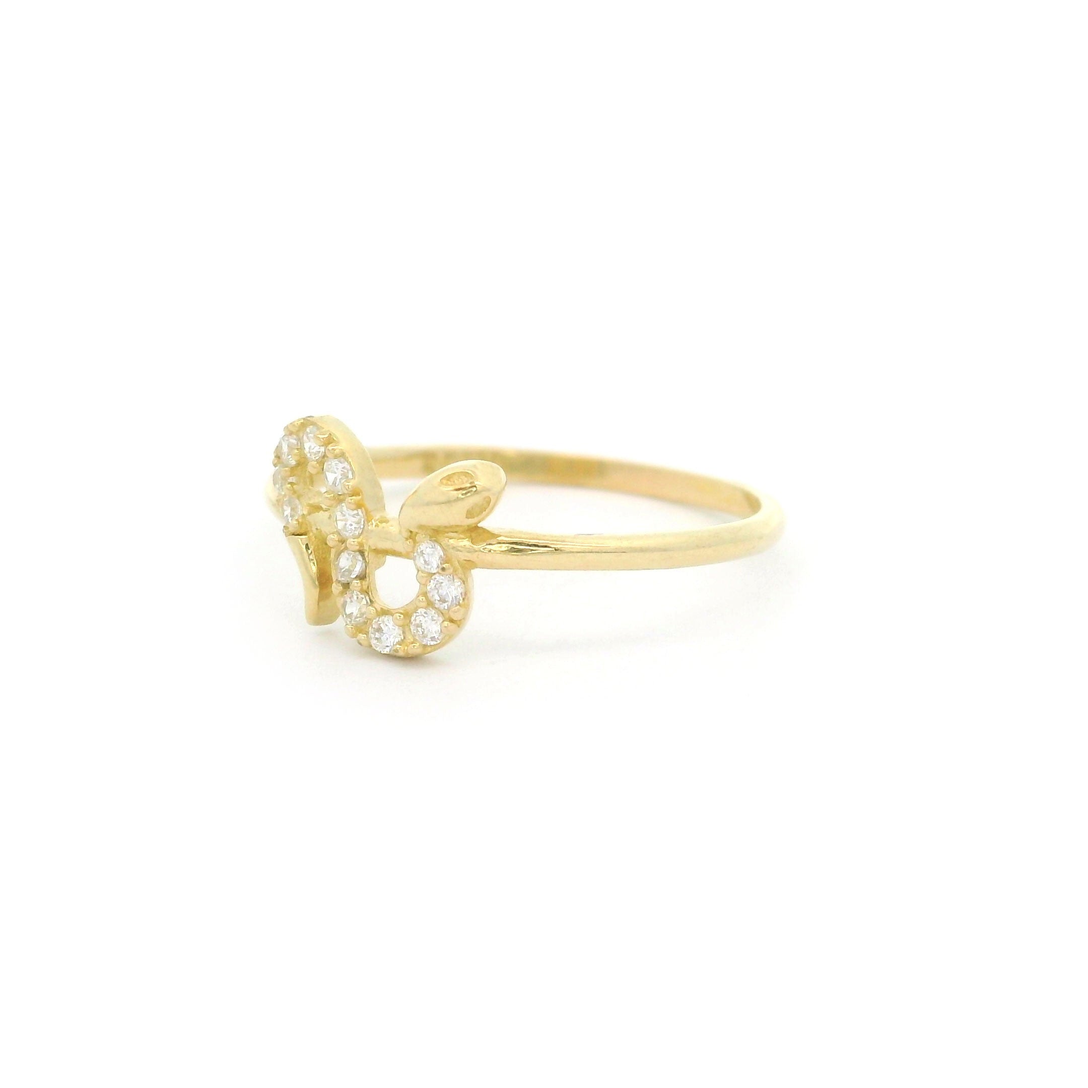 10k yellow gold ring with snake design and cz stones on a white background right side