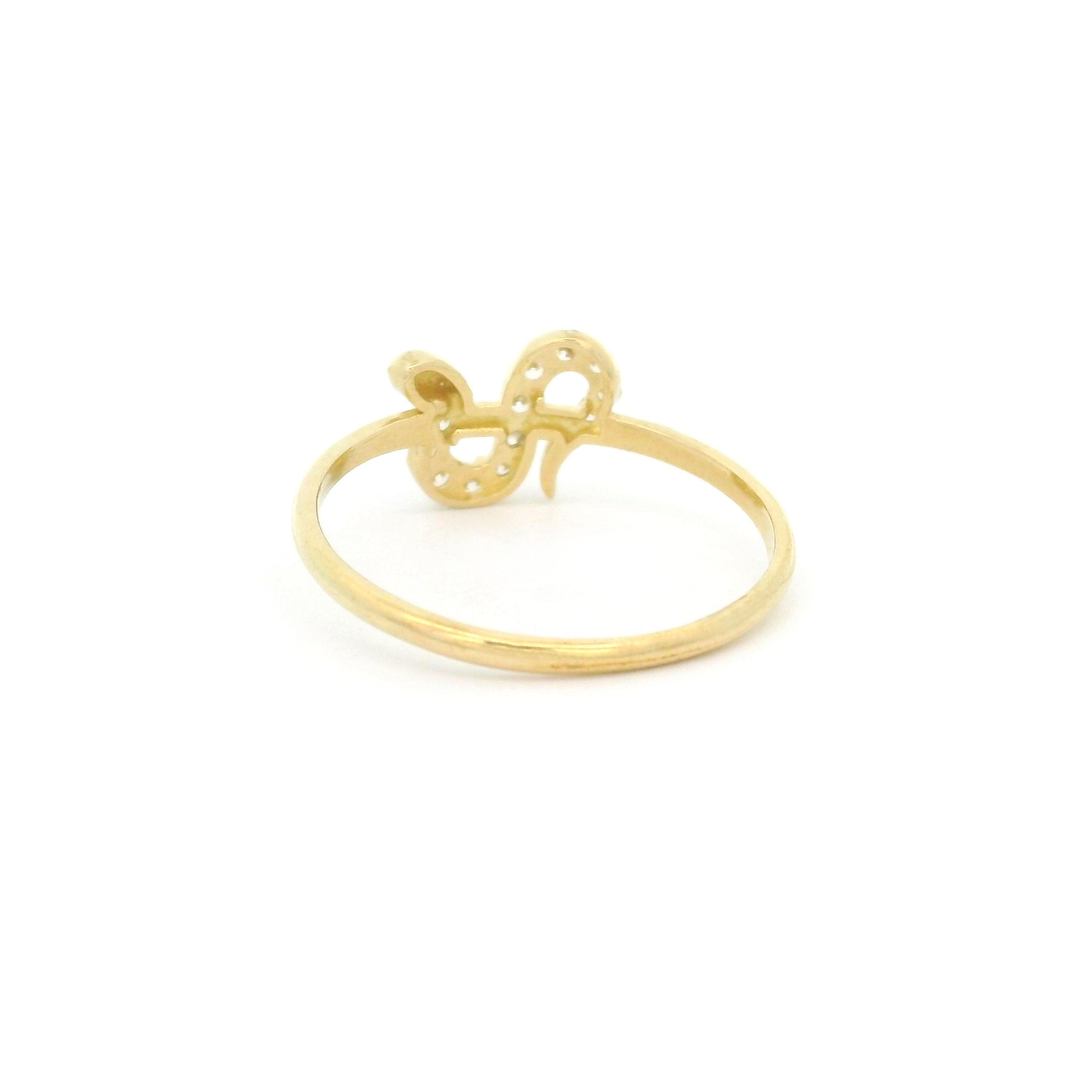 10k yellow gold ring with snake design and cz stones on a white background back view