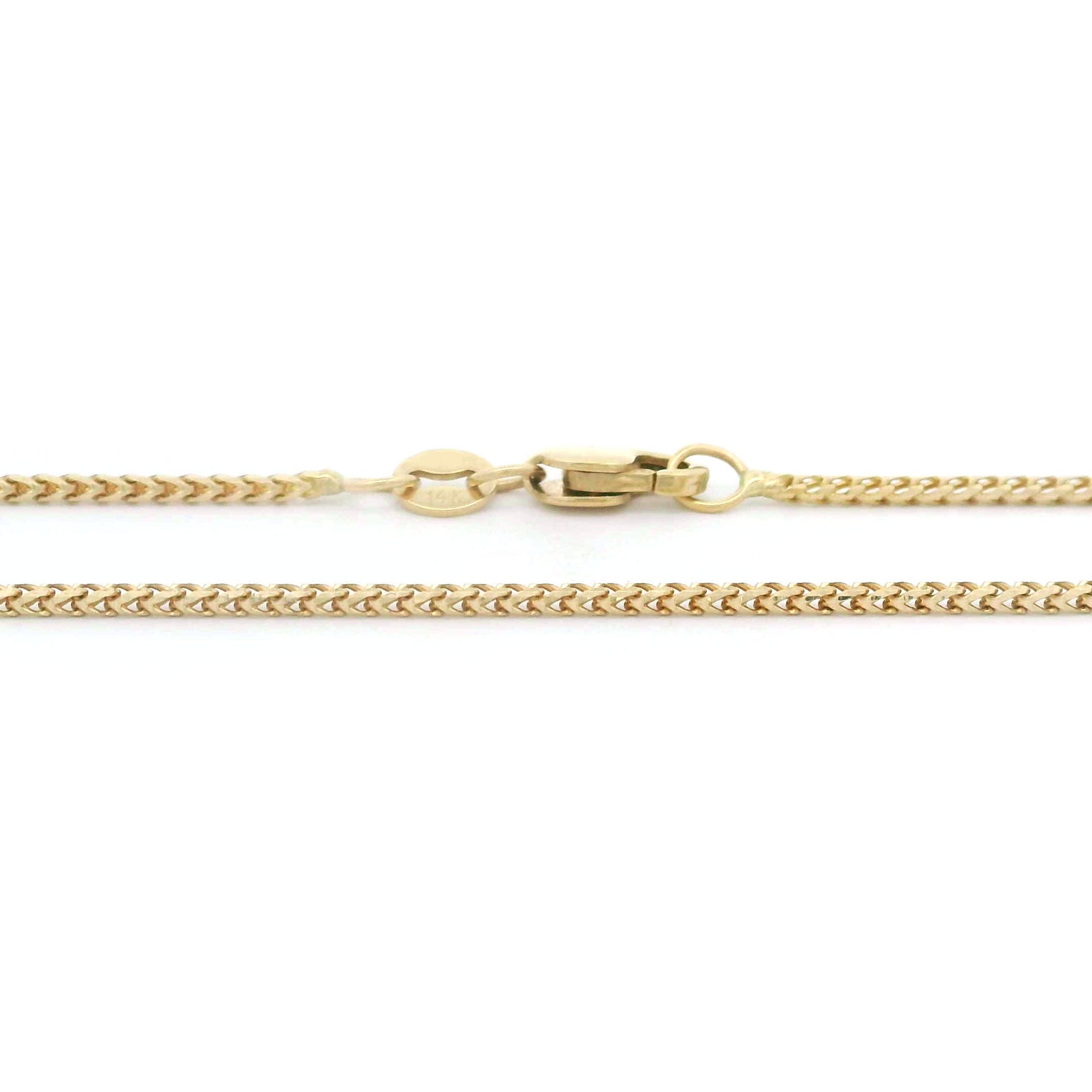 14k Yellow Gold Solid Franco Fine Chain 1.25mm on white background lobster lock