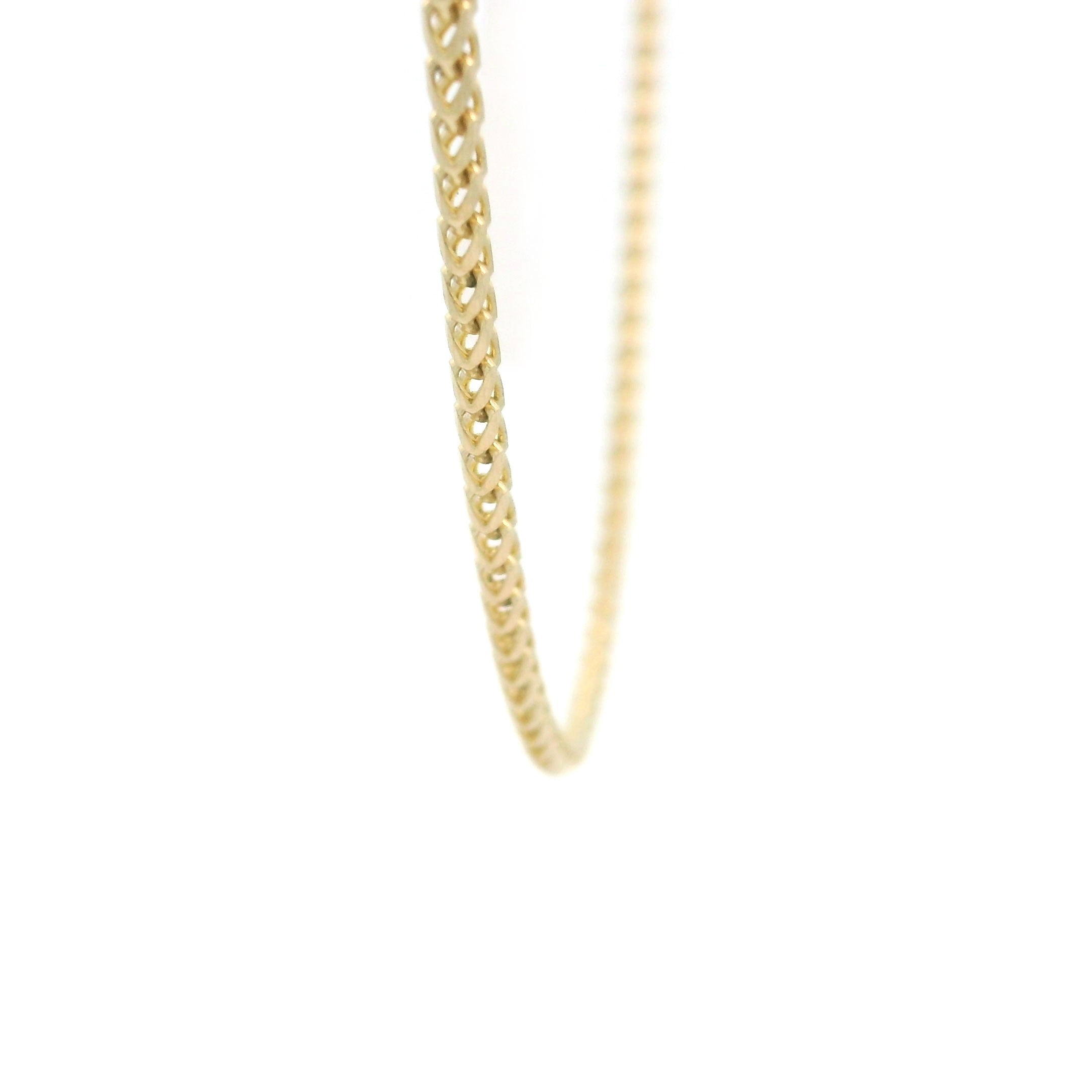 14k Yellow Gold Solid Franco Fine Chain 1.35mm on white background close up