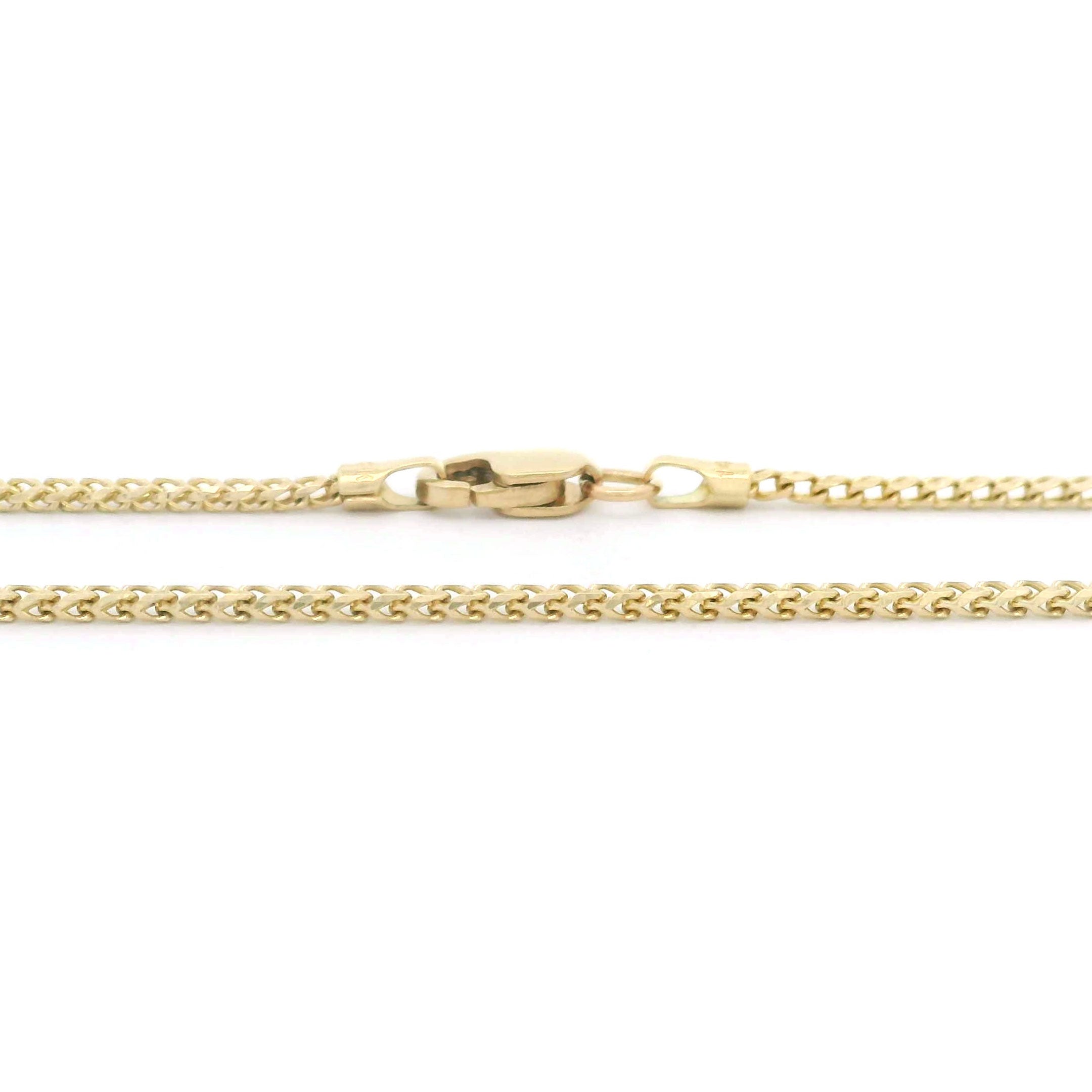 14k Yellow Gold Solid Franco Fine Chain 1.35mm on white background lobster lock