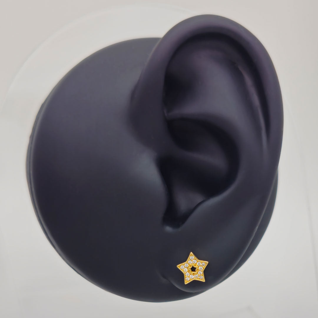14k CZ Star Outline Stud Earrings on Ear Display