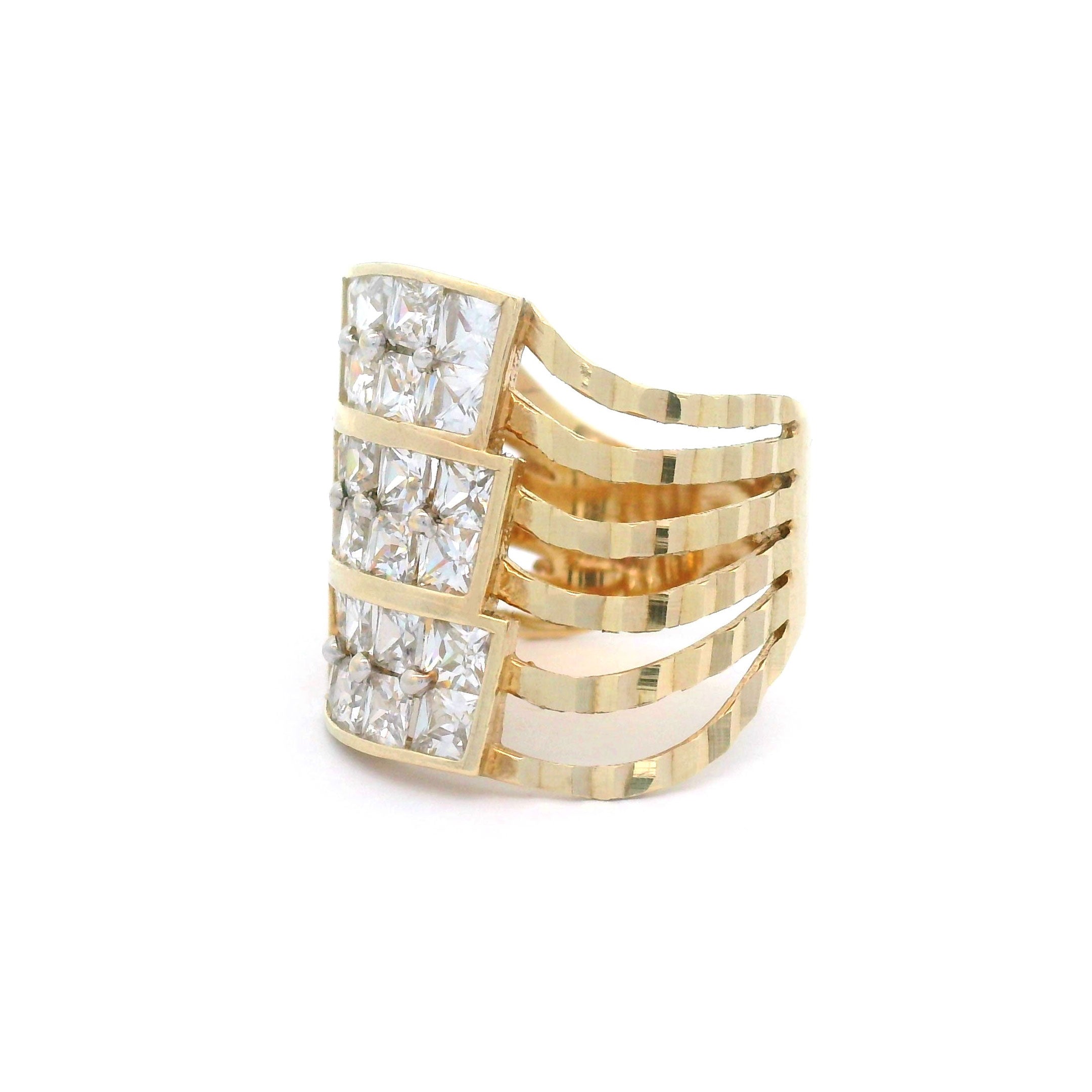 Gold ring with square-cut diamonds on a white background side