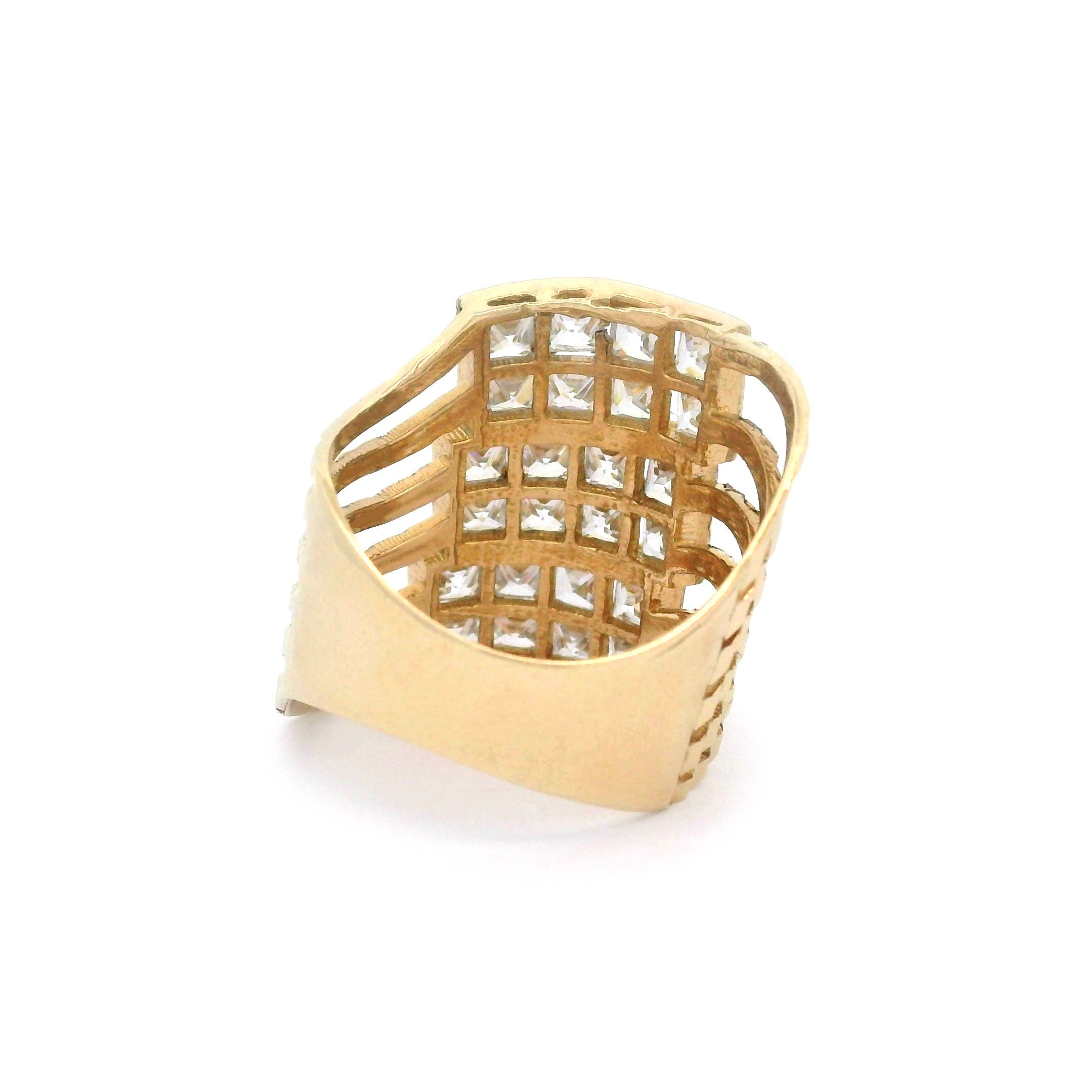 Gold ring with square-cut diamonds on a white background back