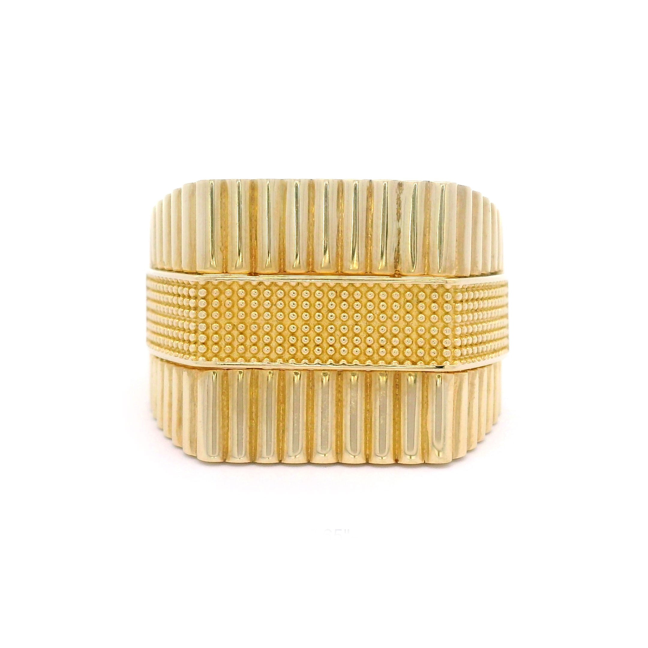Solid 10k gold textured ring on a white background