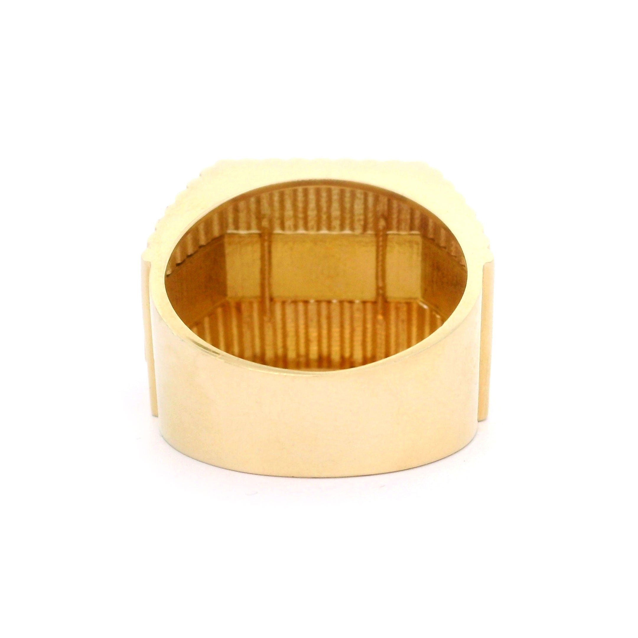 Solid 10k gold textured ring on a white background back