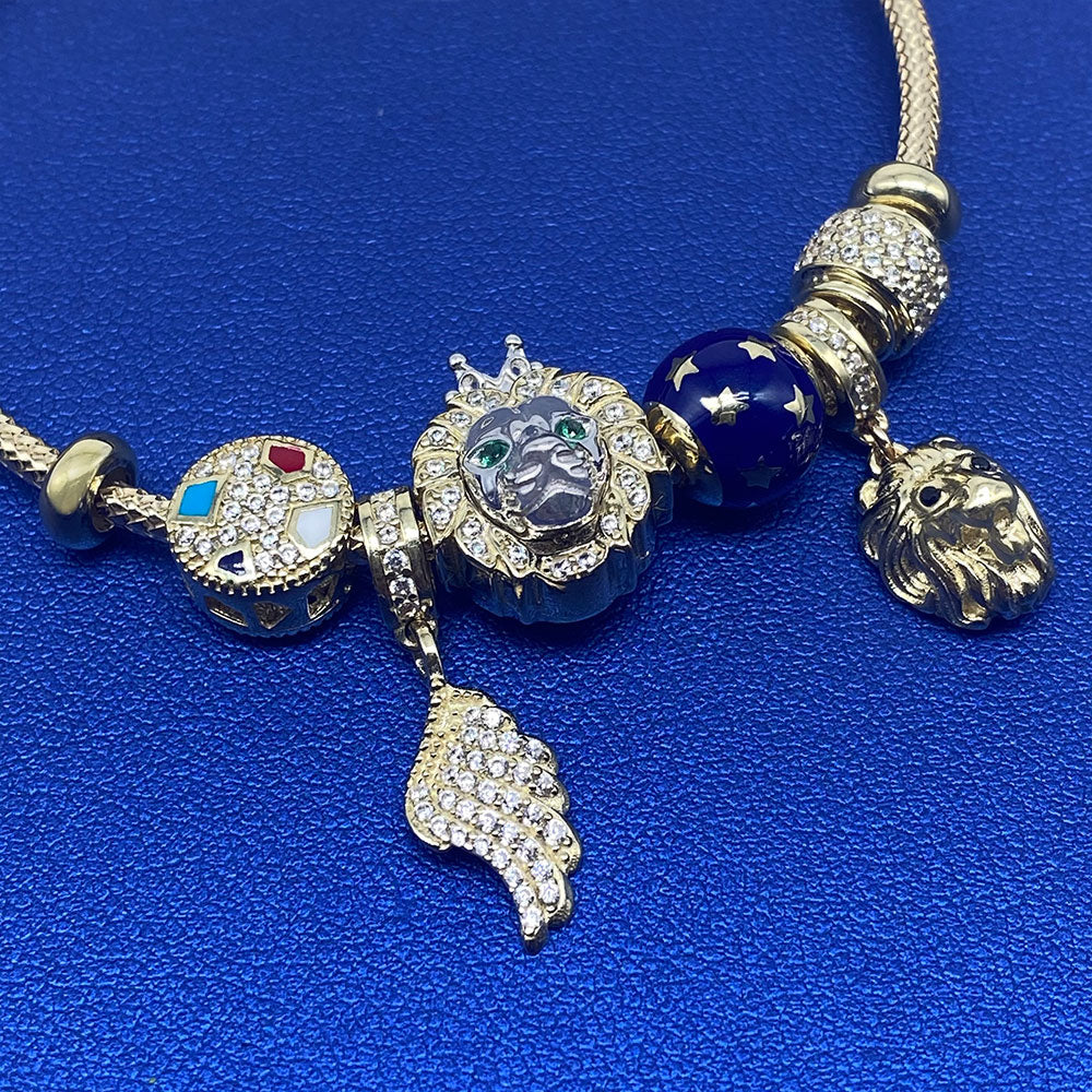 10k CZ Fancy Lion & Angel Wing Charm Bangle Bracelet Blue Background Charms