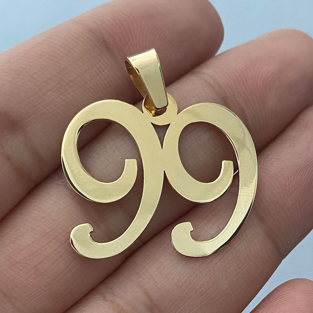 Number 99 Pendant in Gold in Hand