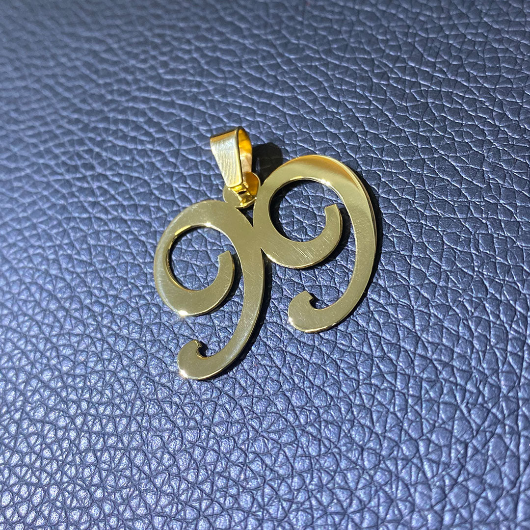 Number 99 Pendant in Gold on Black Background