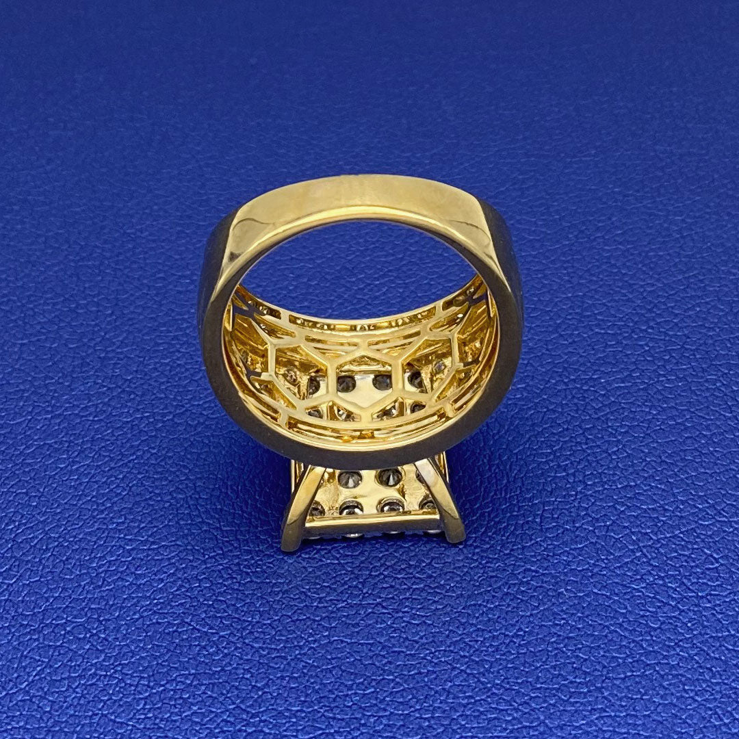 Gold ring with diamond square cluster on a blue finger display upside down
