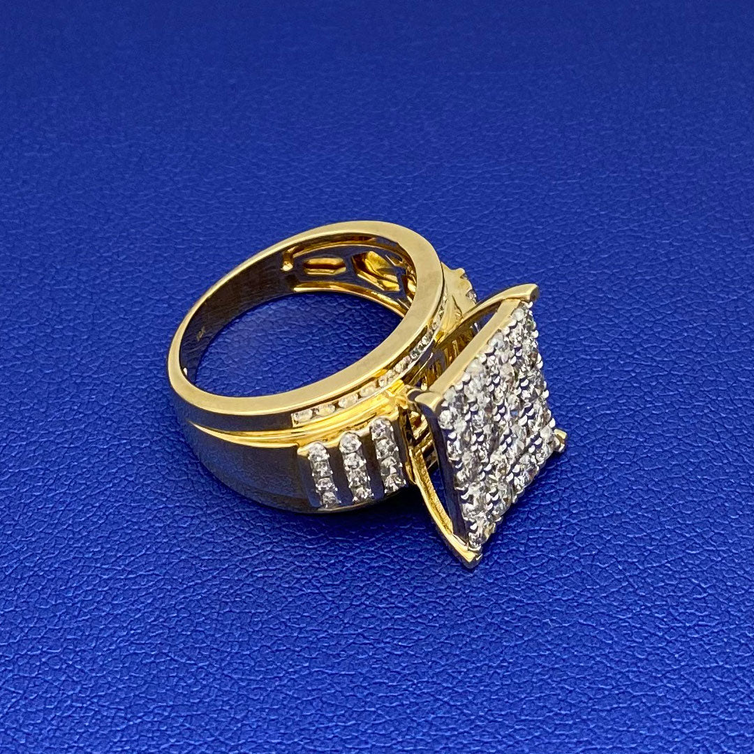 Gold ring with diamond square cluster on a blue finger display angle
