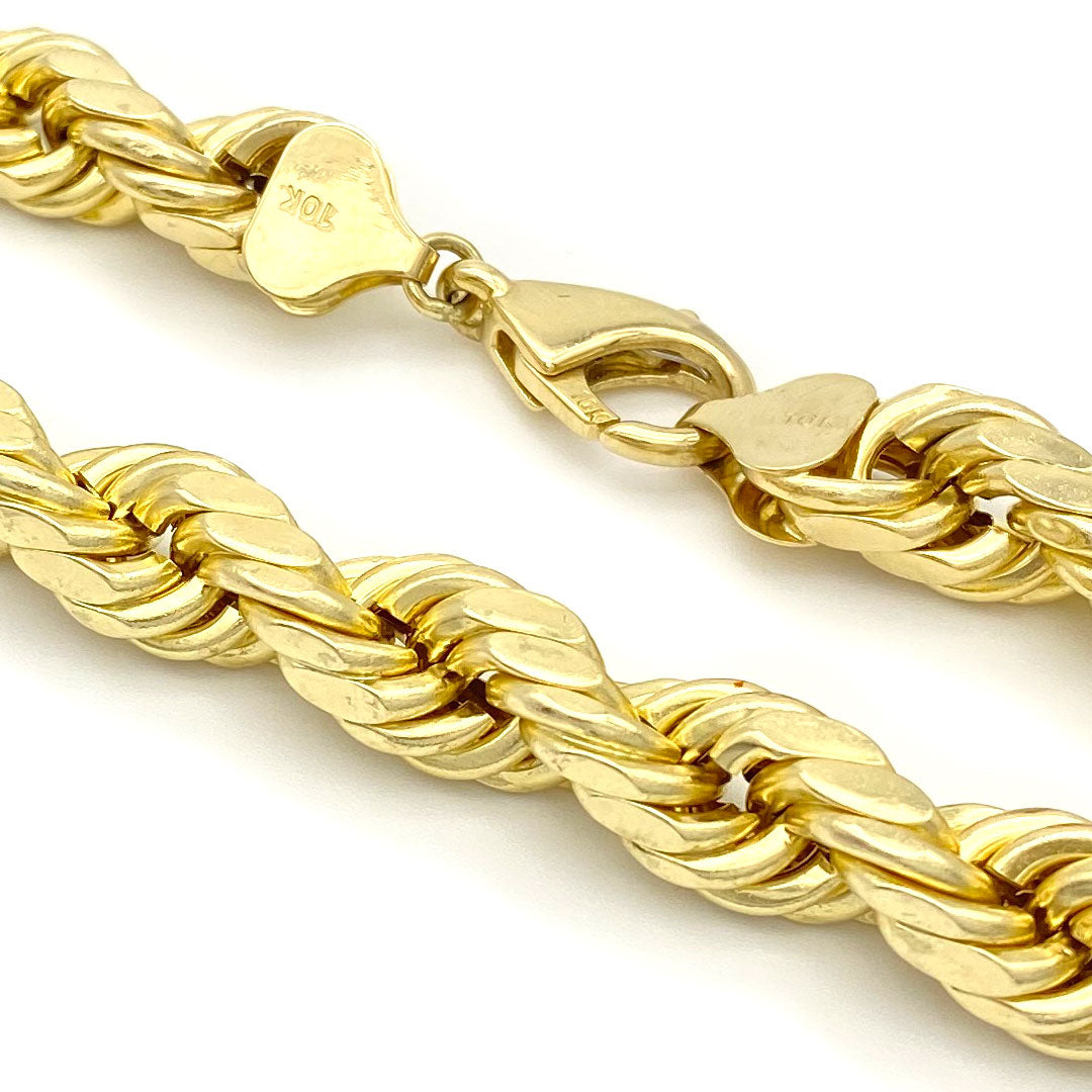 9mm 10k yellow gold hollow rope chain with diamond cuts on a white background close